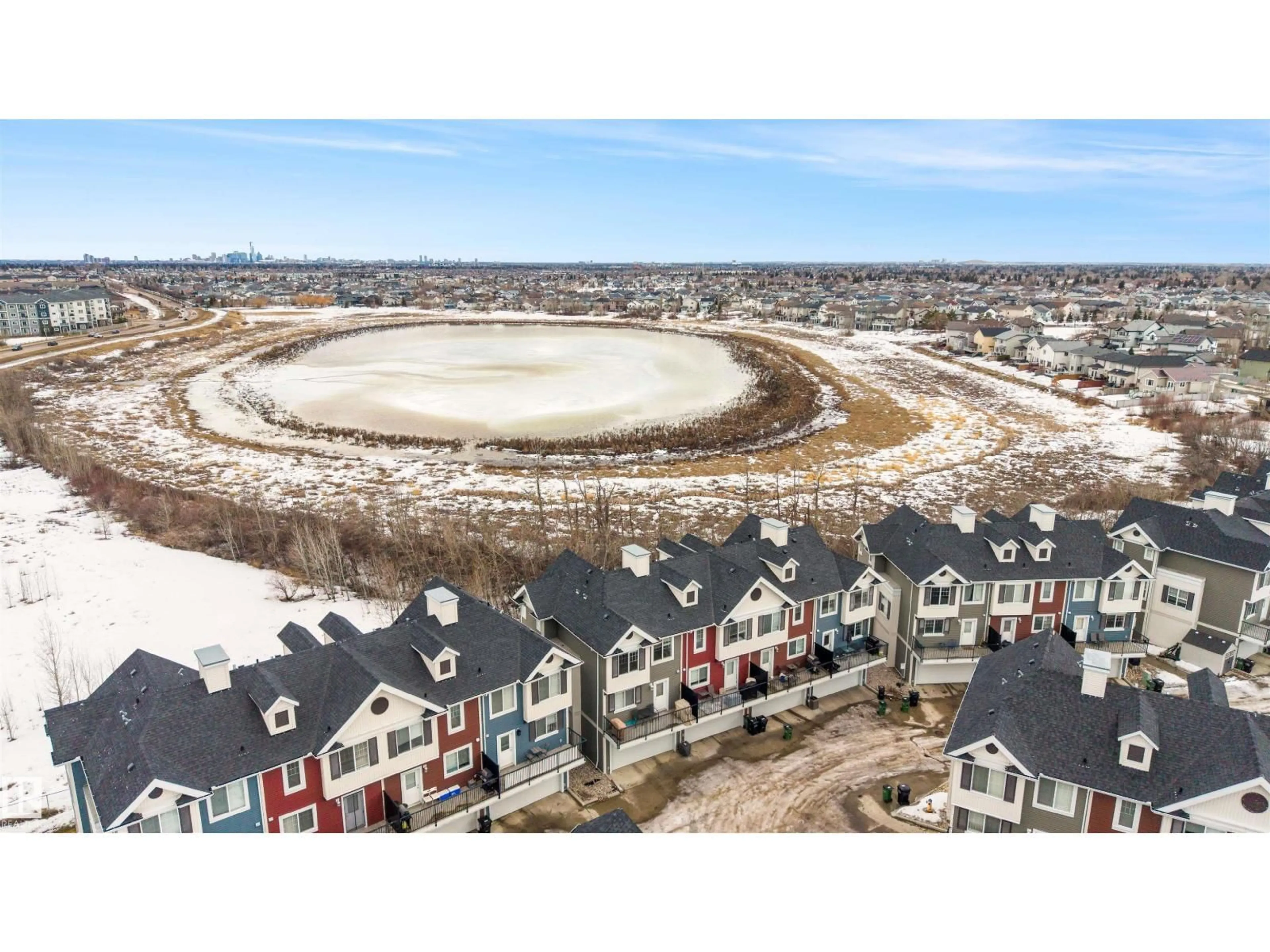 A pic from outside/outdoor area/front of a property/back of a property/a pic from drone, unknown for #33 - 8315 180 AV, Edmonton Alberta T5Z0J2