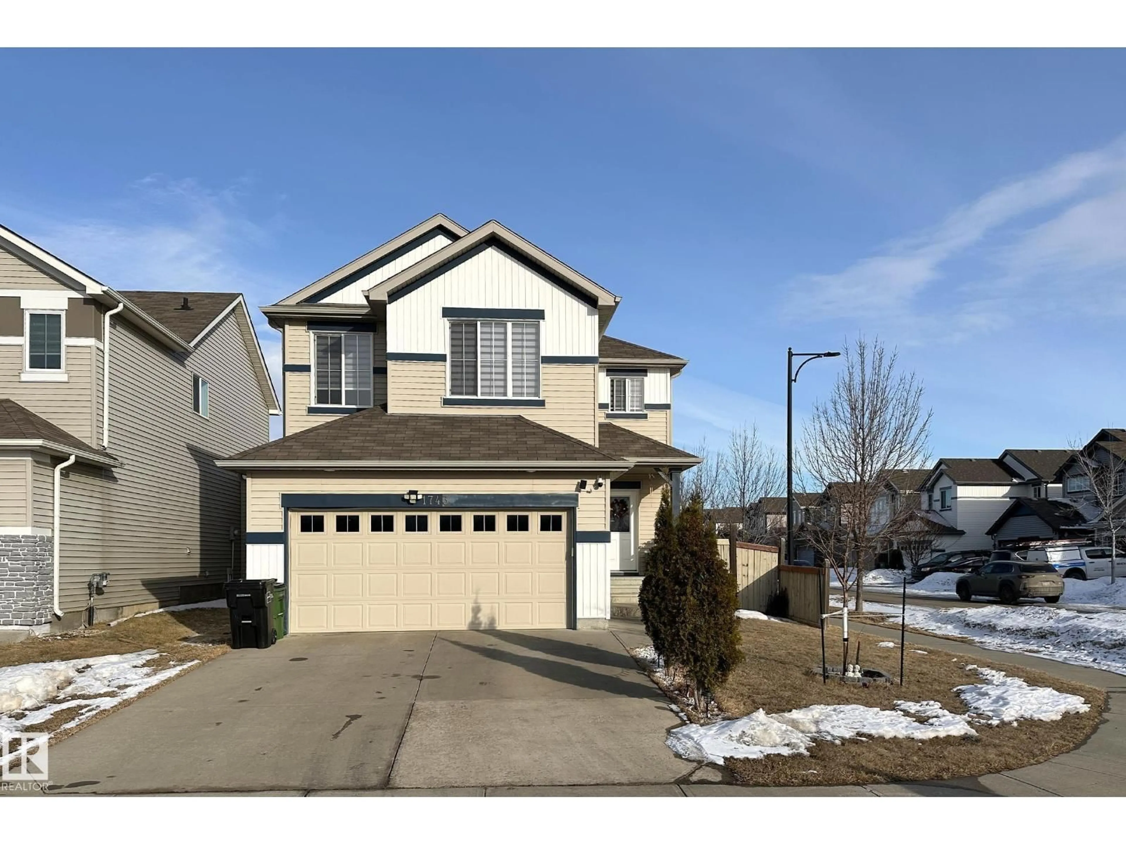 Home with vinyl exterior material, street for SW - 1743 60 ST, Edmonton Alberta T6X0W4