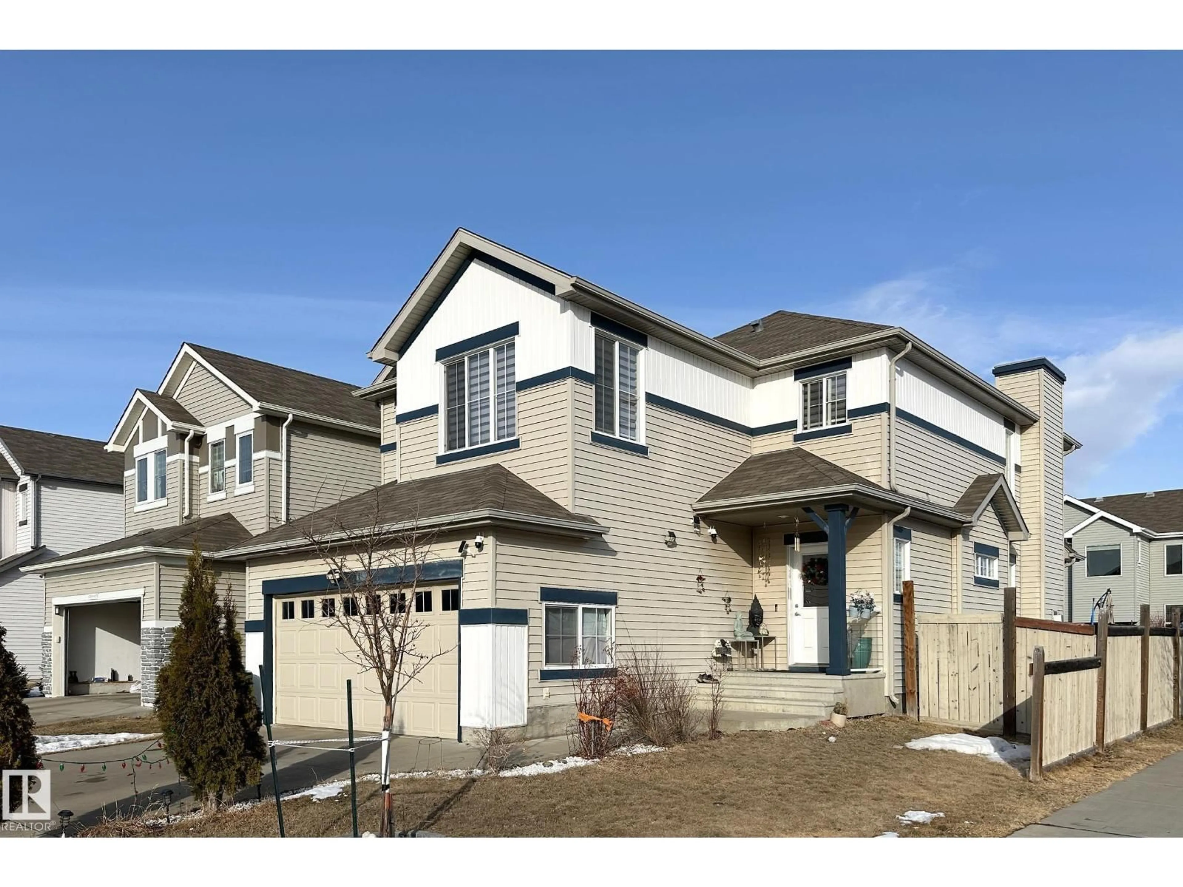 Home with vinyl exterior material, street for SW - 1743 60 ST, Edmonton Alberta T6X0W4