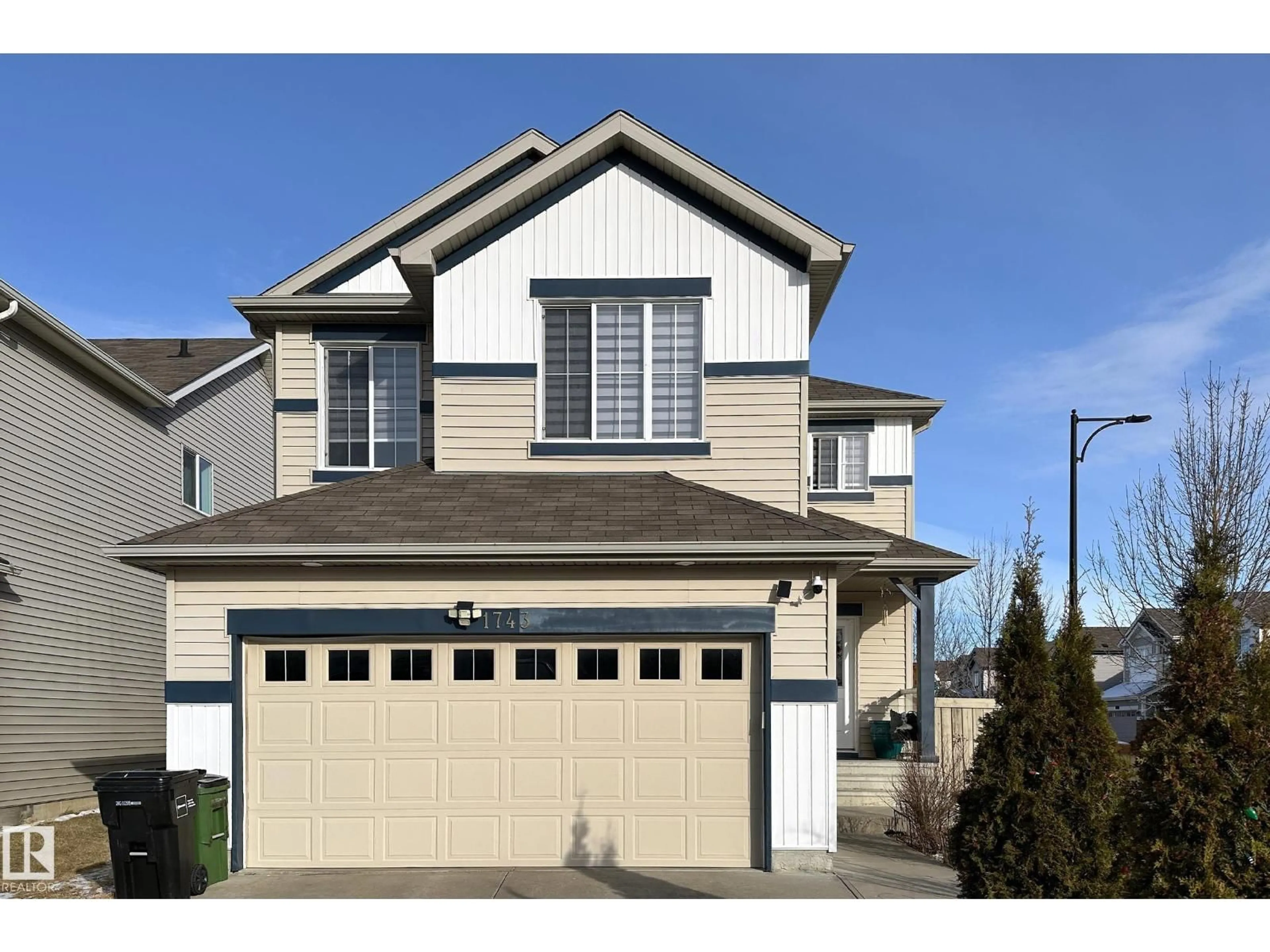 Home with vinyl exterior material, street for SW - 1743 60 ST, Edmonton Alberta T6X0W4