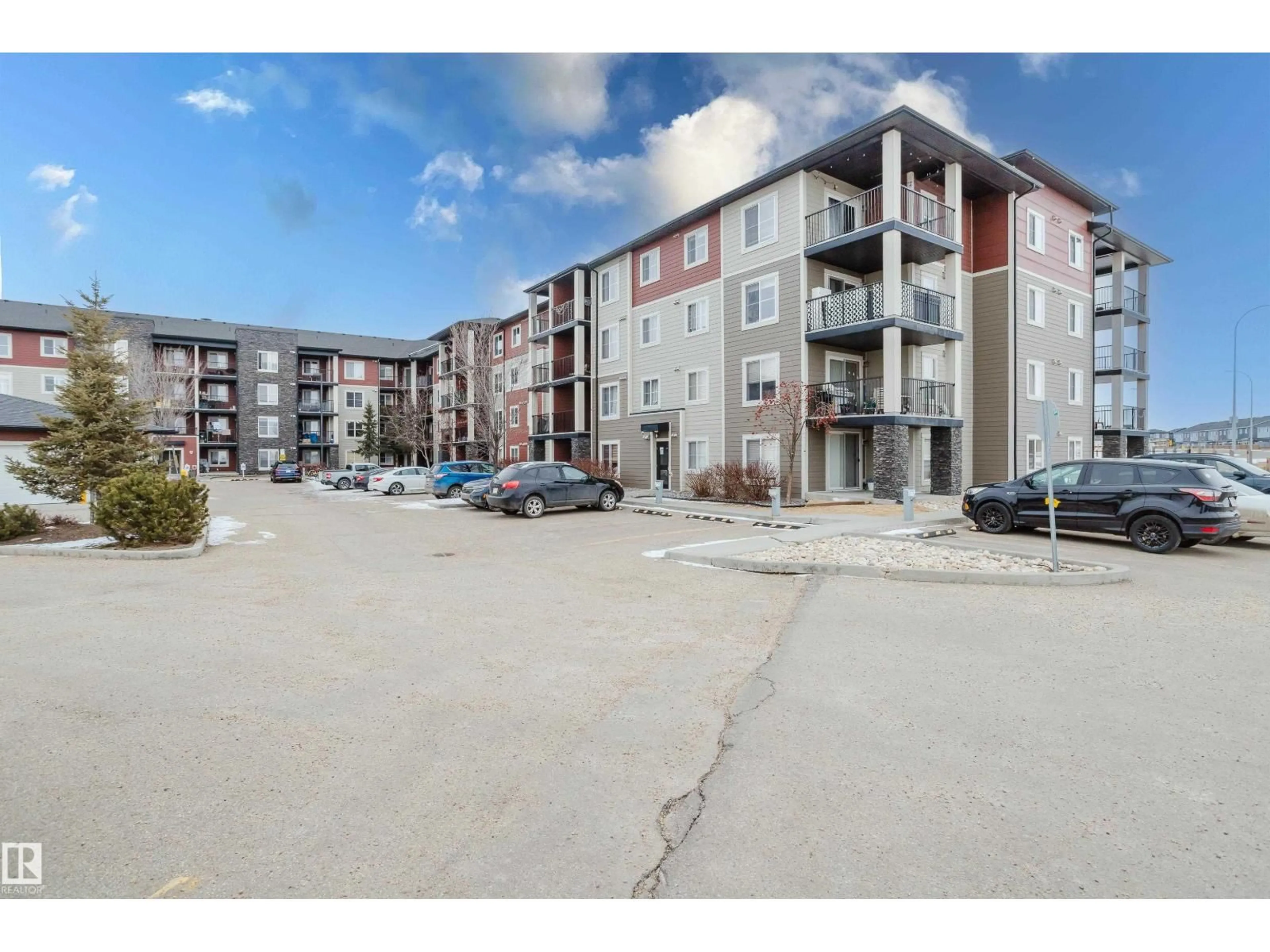 A pic from outside/outdoor area/front of a property/back of a property/a pic from drone, unknown for 1510 - 119 WATT DR, Edmonton Alberta T6X2E6