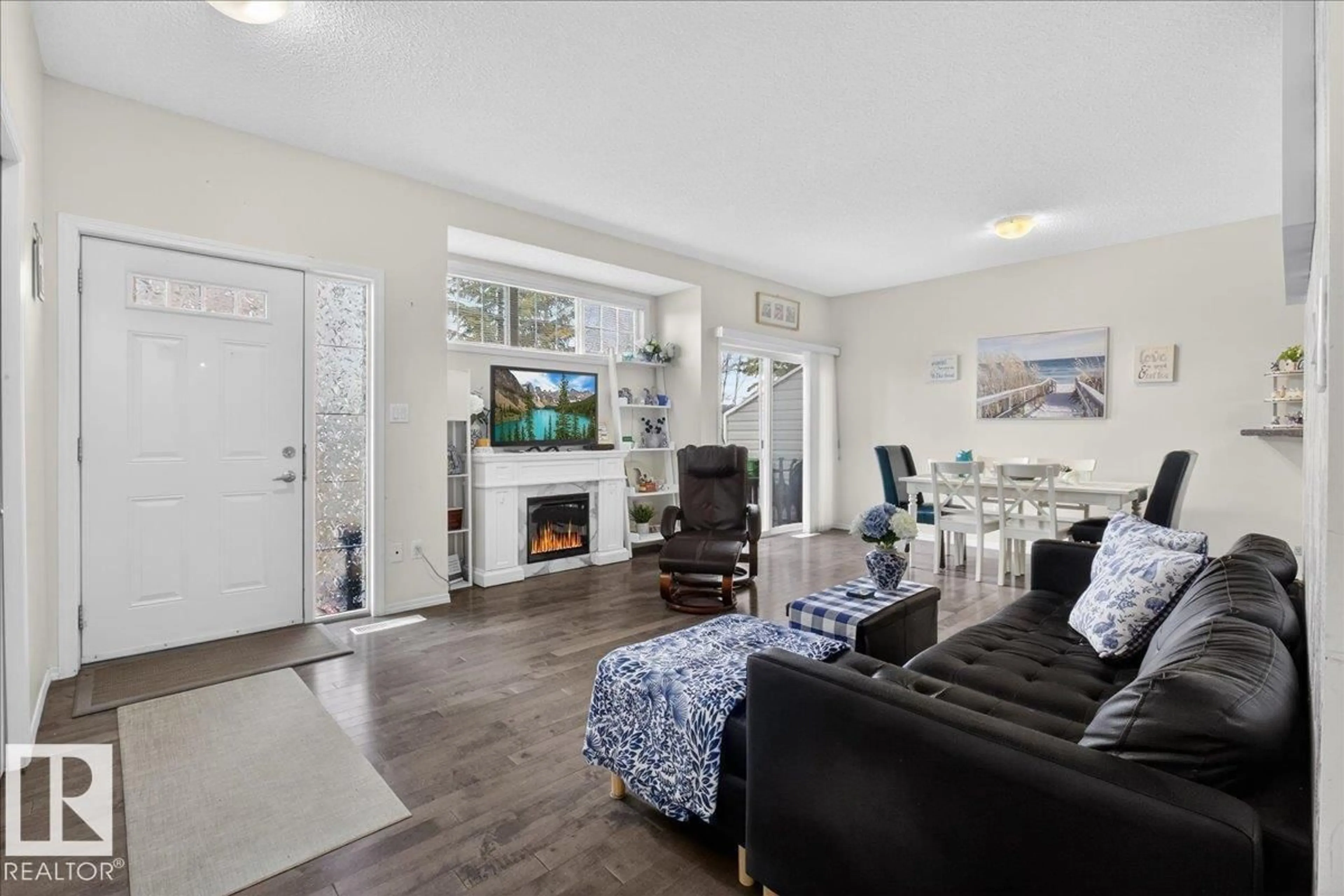 Living room with furniture, unknown for #17 - 1179 SUMMERSIDE DR, Edmonton Alberta T6X1K1