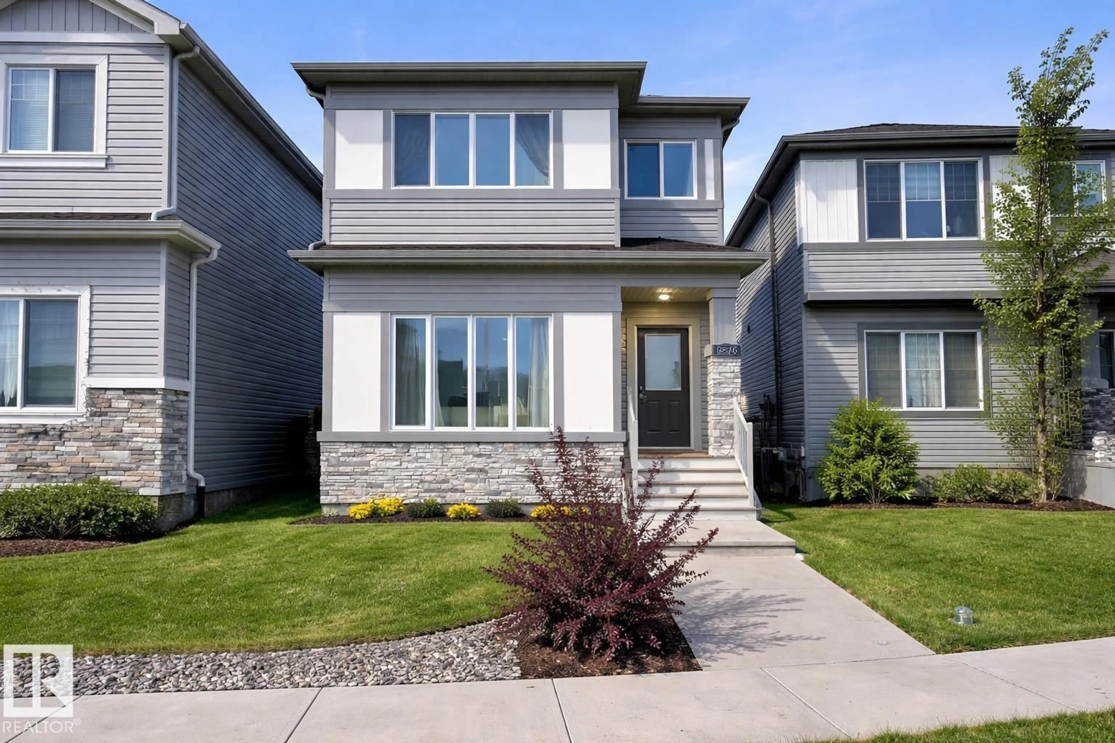 Home with vinyl exterior material, street for NW - 9876 206 ST, Edmonton Alberta T5T7L5