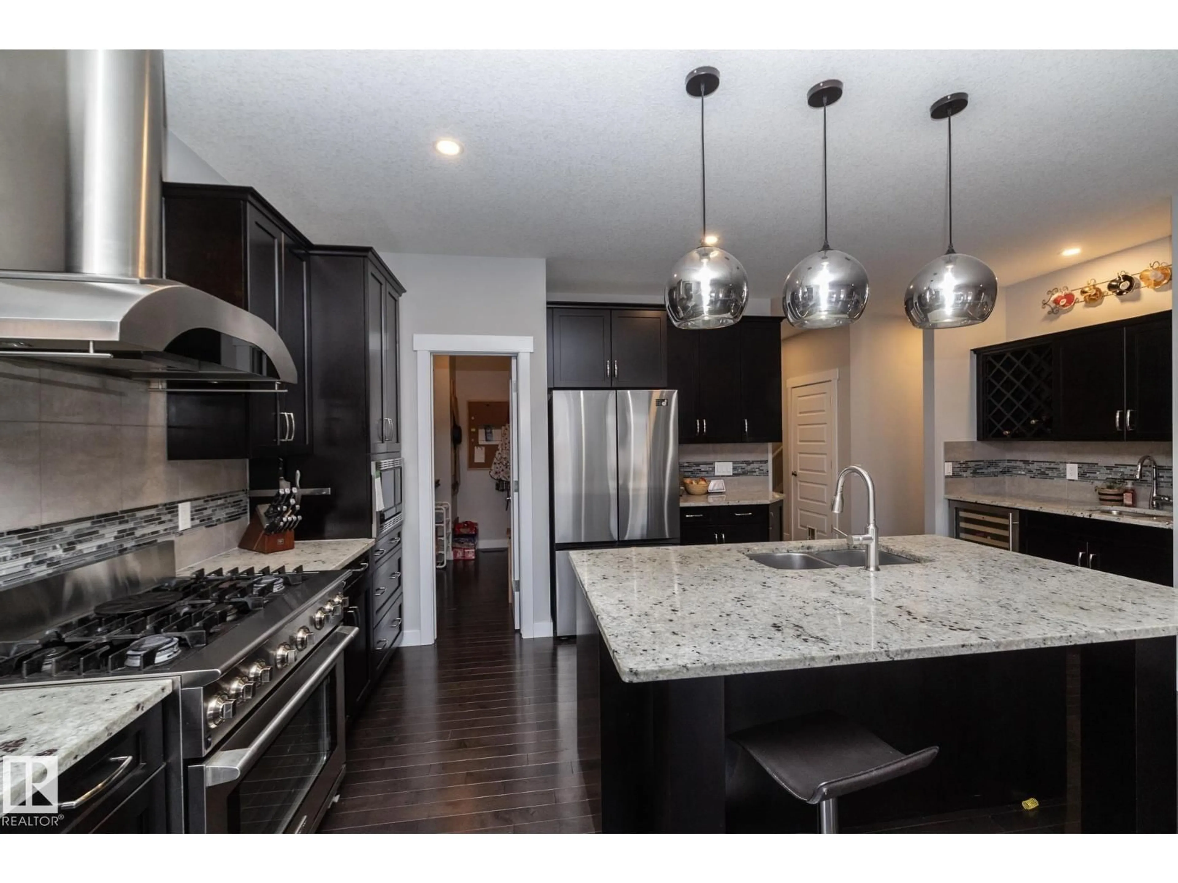 Open concept kitchen, unknown for 7608 179 AV, Edmonton Alberta T5Z0L2