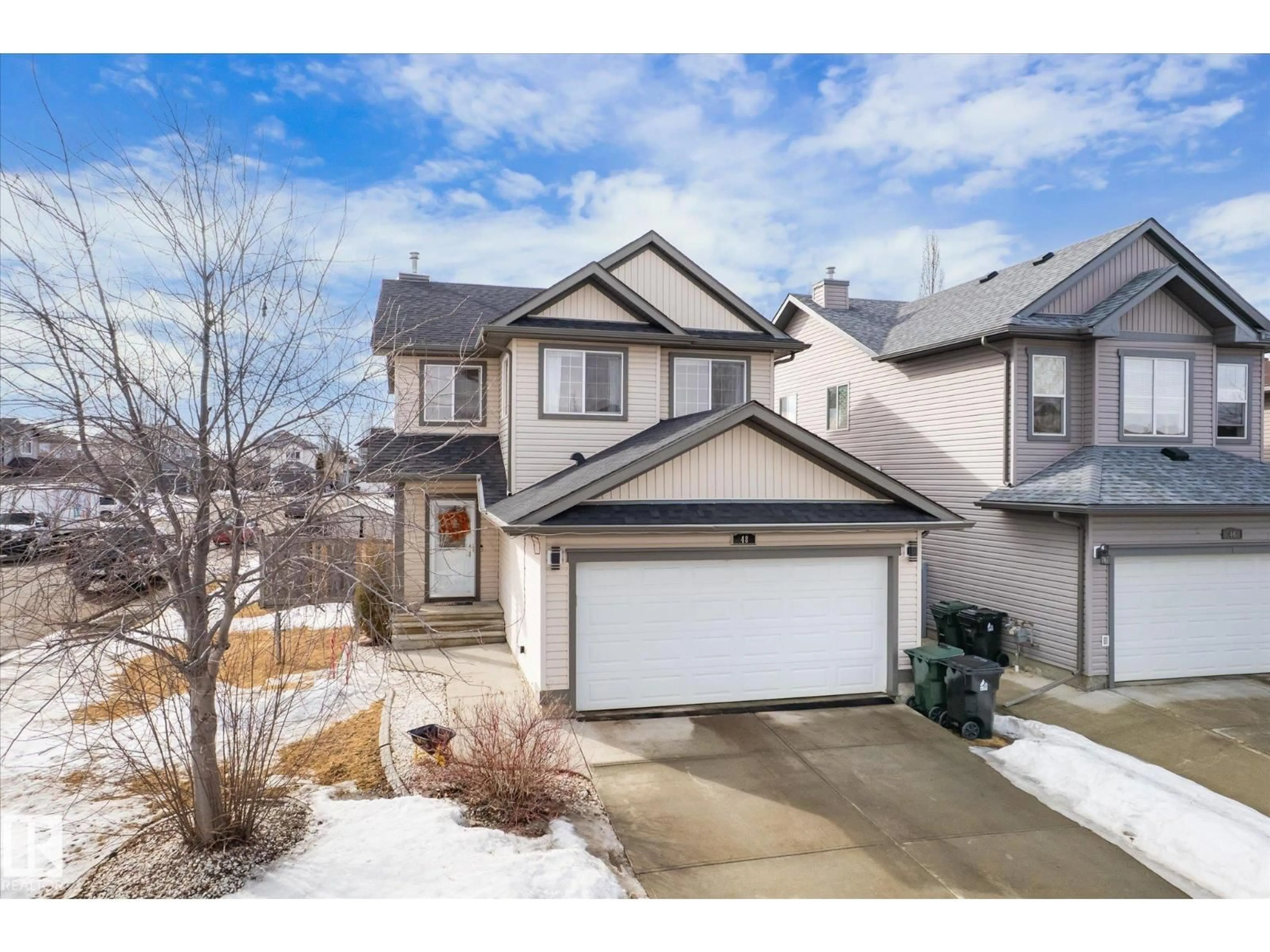 A pic from outside/outdoor area/front of a property/back of a property/a pic from drone, street for 48 GREYSTONE CR, Spruce Grove Alberta T7X0A7