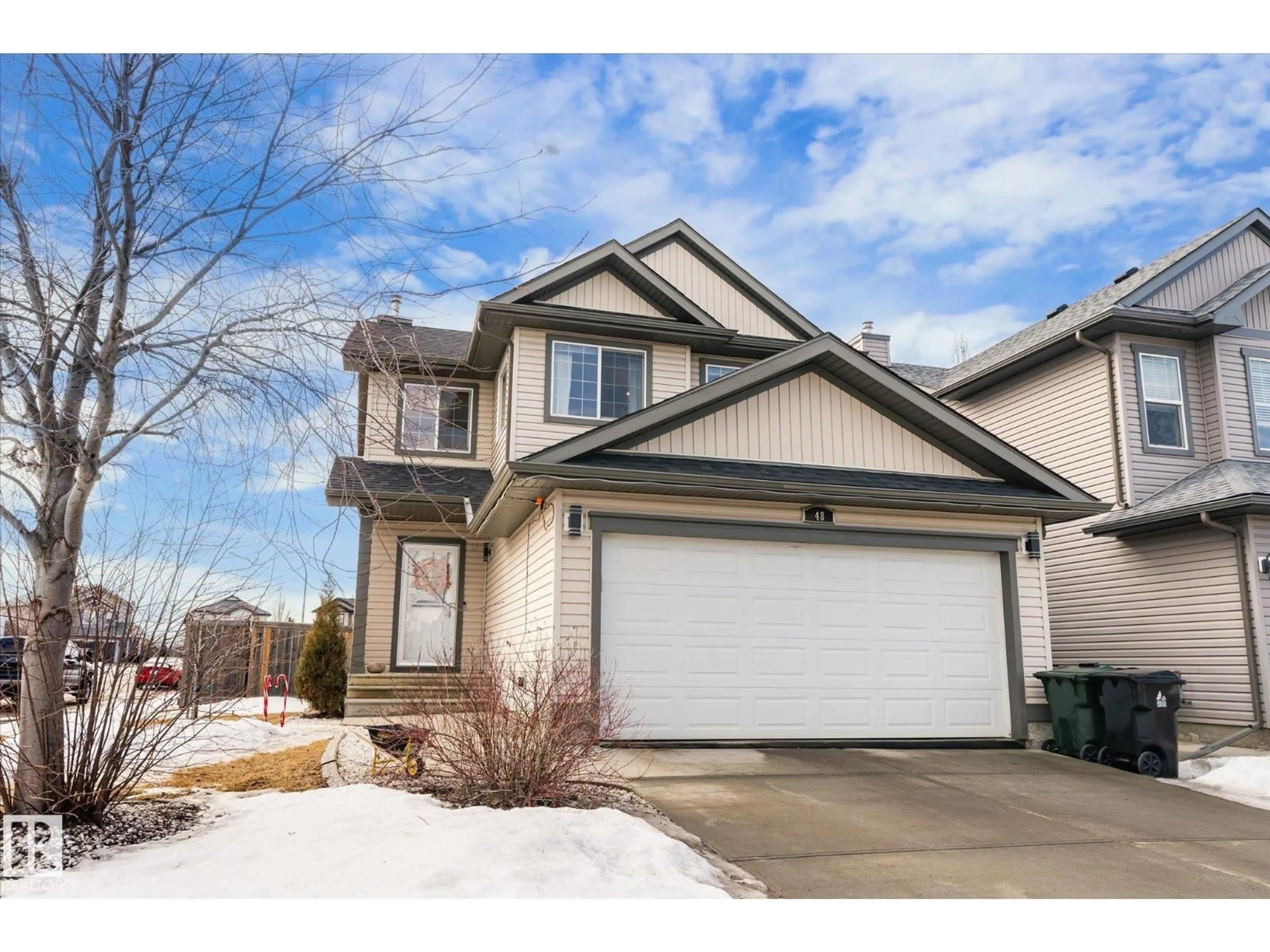 Home with vinyl exterior material, street for 48 GREYSTONE CR, Spruce Grove Alberta T7X0A7