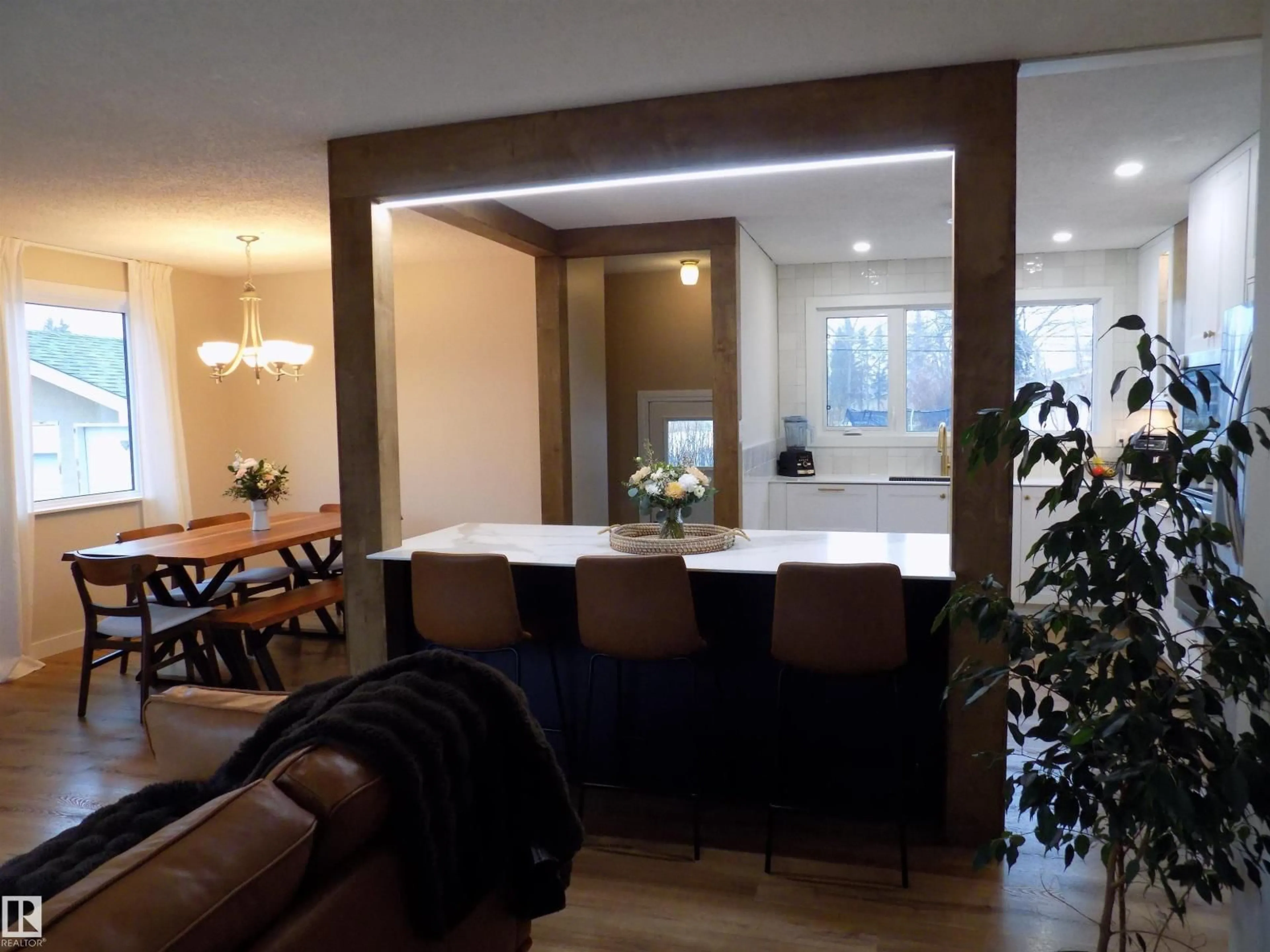 Open concept kitchen, wood/laminate floor for 5308 52 AVENUE, Wetaskiwin Alberta T9A0X7