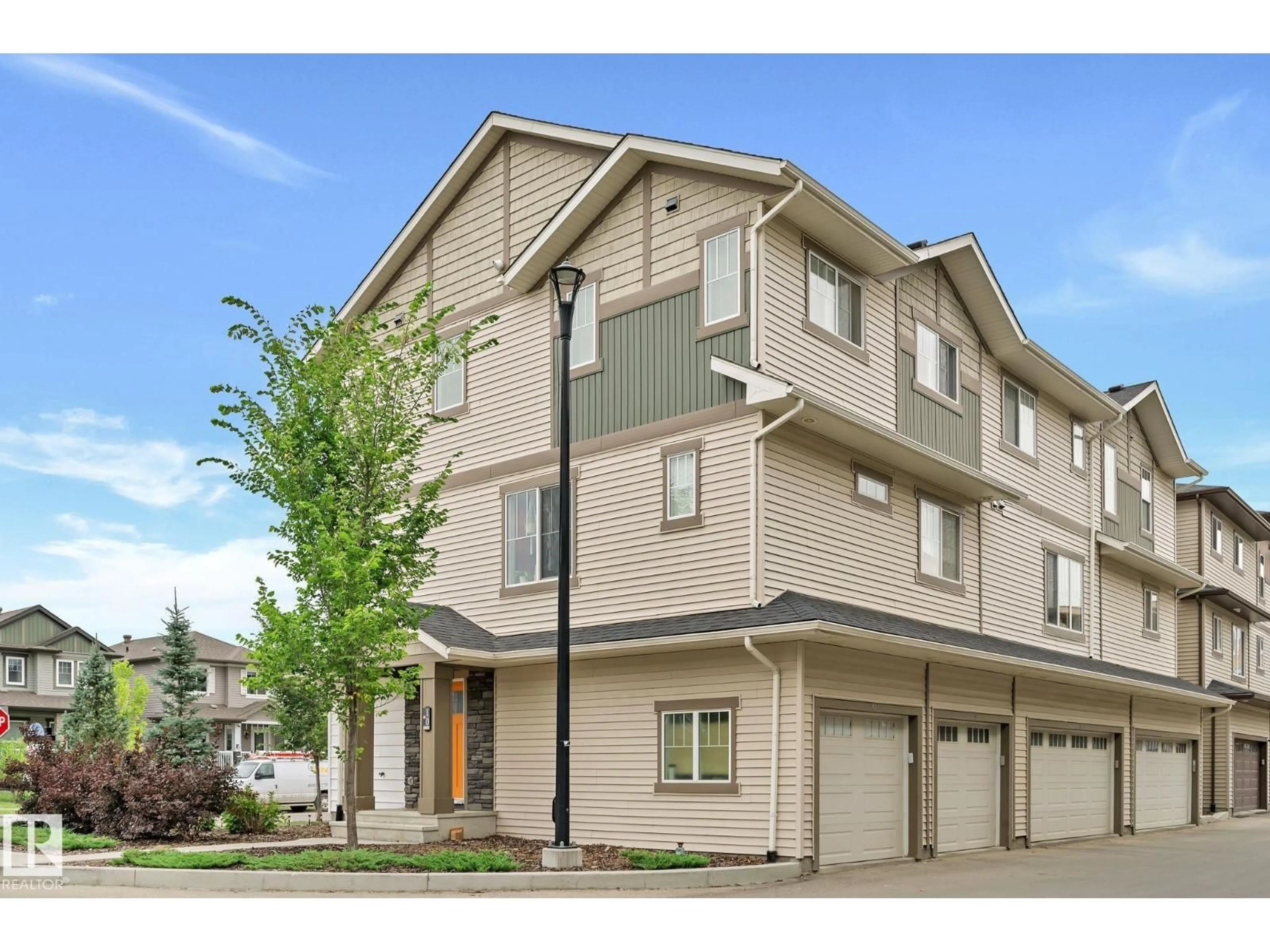 Home with vinyl exterior material, street for 1530 - 10 TAMARACK BV, Edmonton Alberta T6T2E6