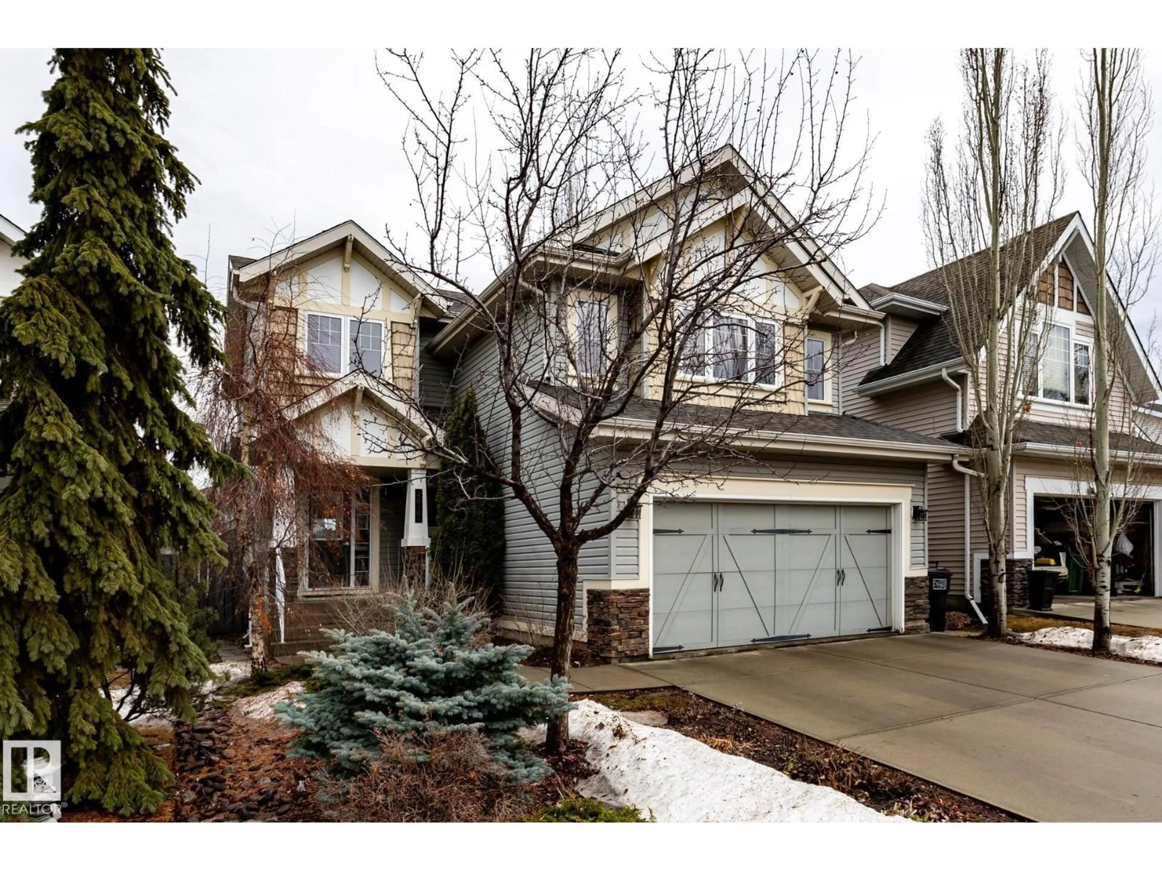 Home with brick exterior material, street for NW - 4815 209 ST, Edmonton Alberta T6M3A4