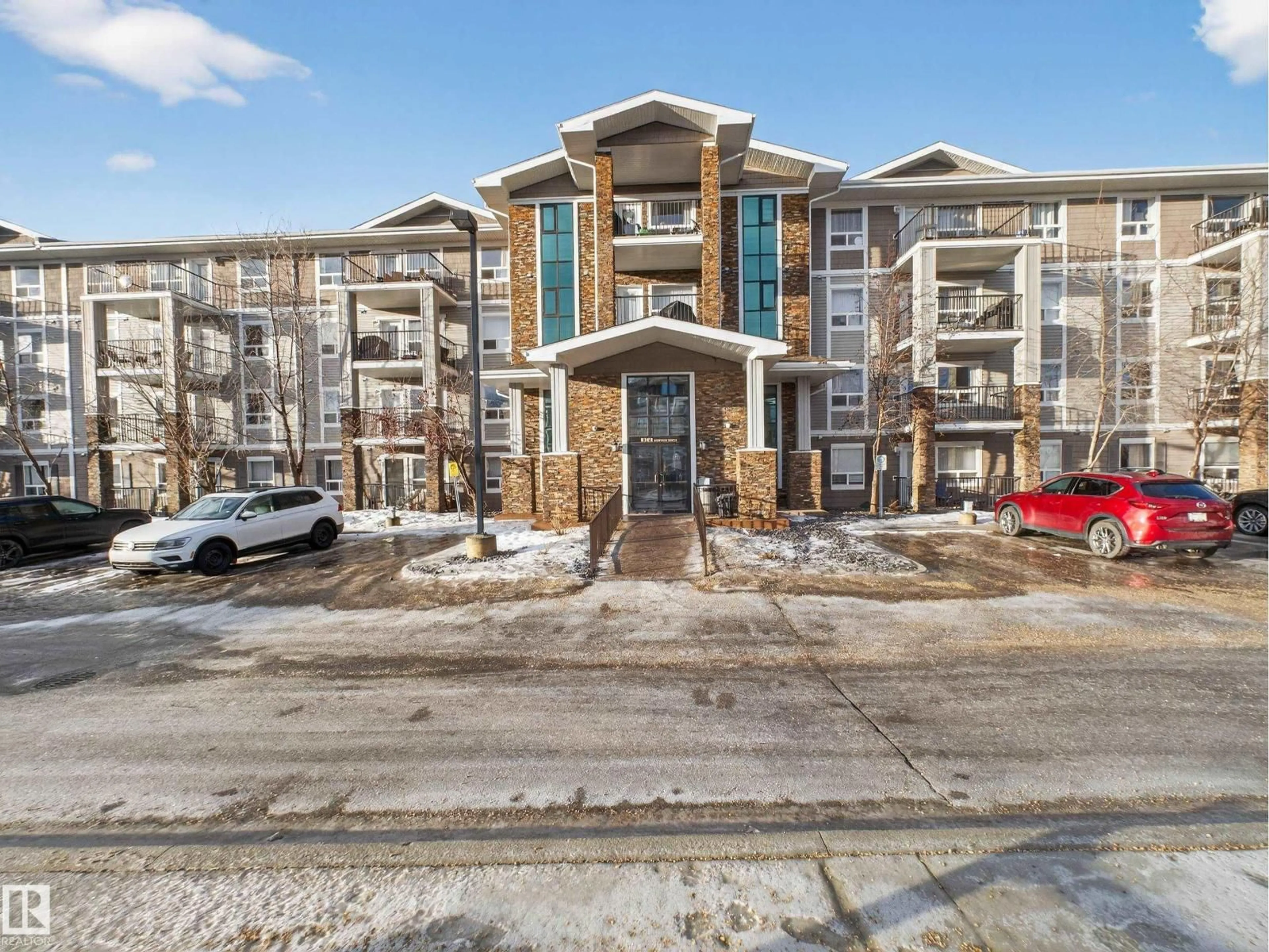 A pic from outside/outdoor area/front of a property/back of a property/a pic from drone, building for 9363 - 1111 SIMPSON DR, Edmonton Alberta T6R0N2