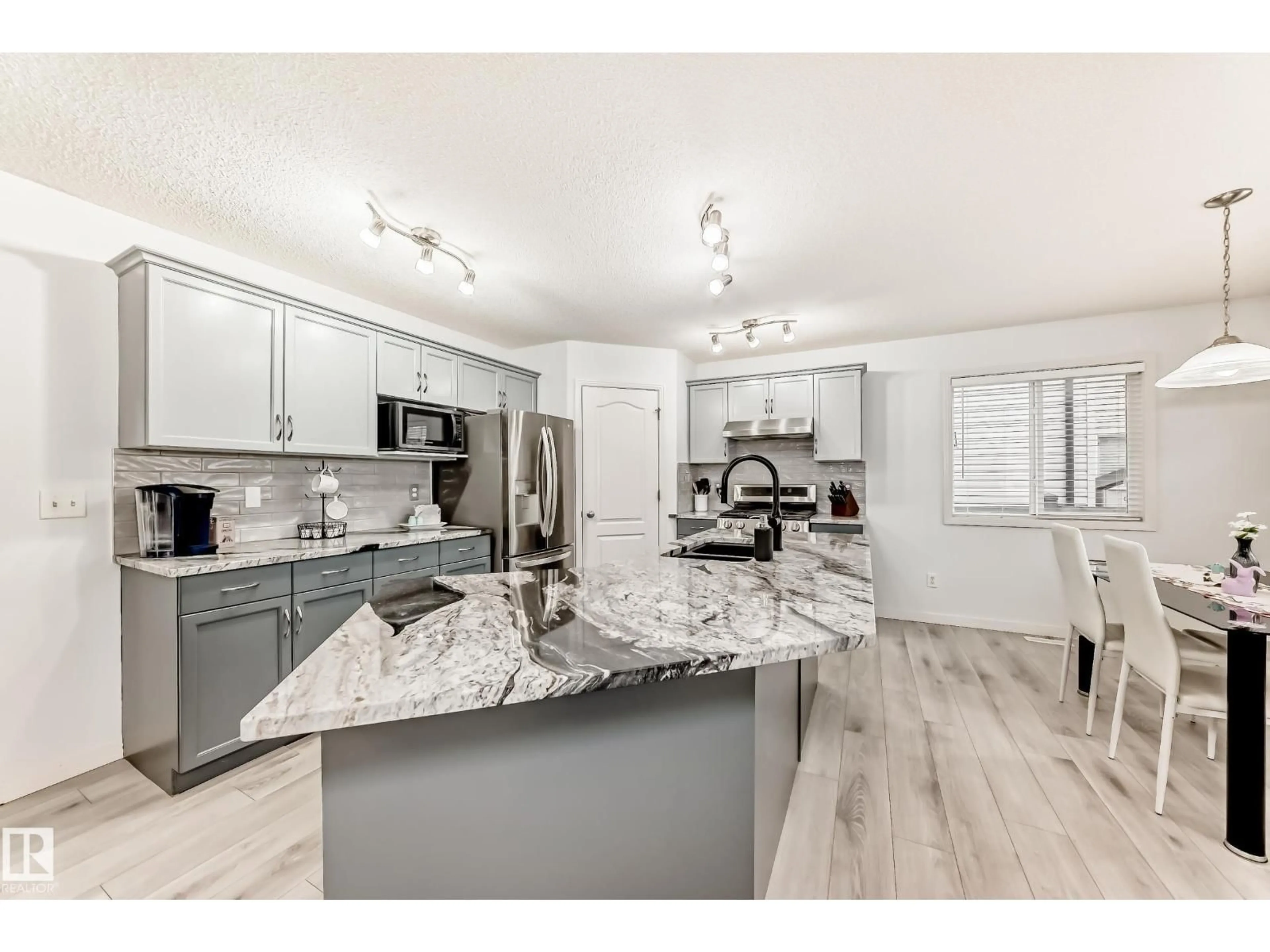 Open concept kitchen, unknown for NW - 5305 205 ST, Edmonton Alberta T6M2Y7