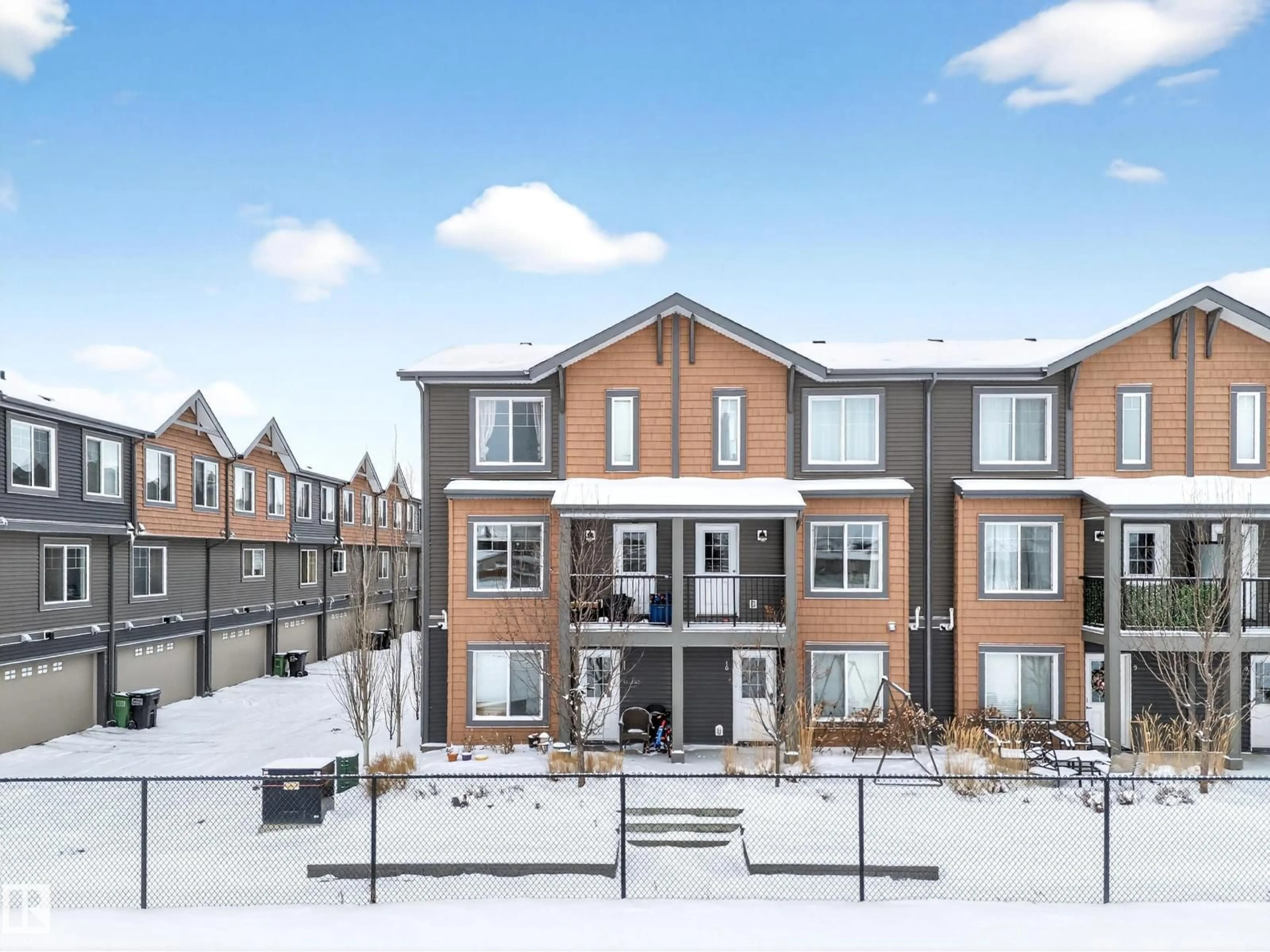 A pic from outside/outdoor area/front of a property/back of a property/a pic from drone, unknown for #11 - 3025 151 AV, Edmonton Alberta T5Y3W4