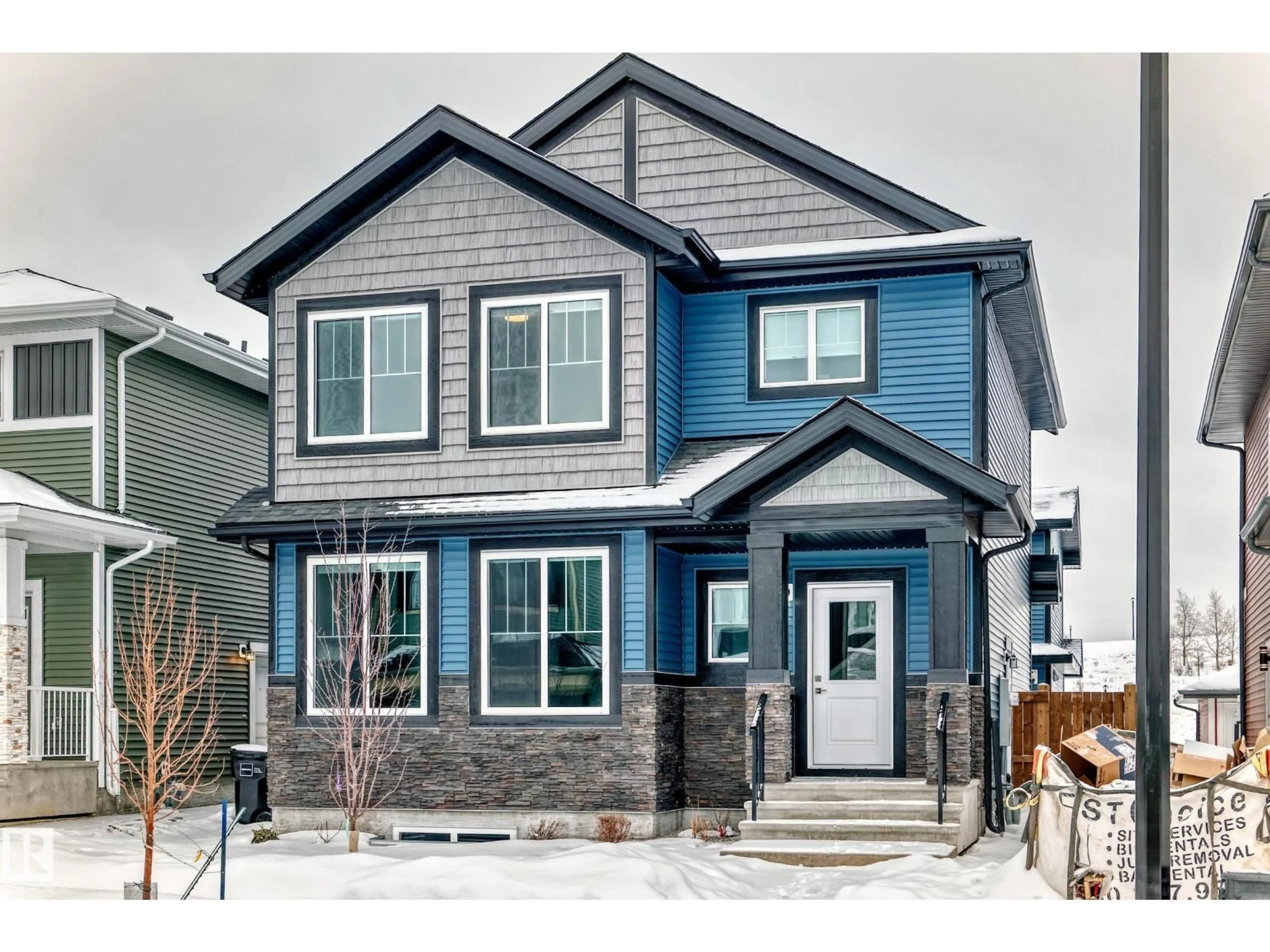 Home with vinyl exterior material, street for NW - 3323 ROY BROWN WY, Edmonton Alberta T5E6Z9