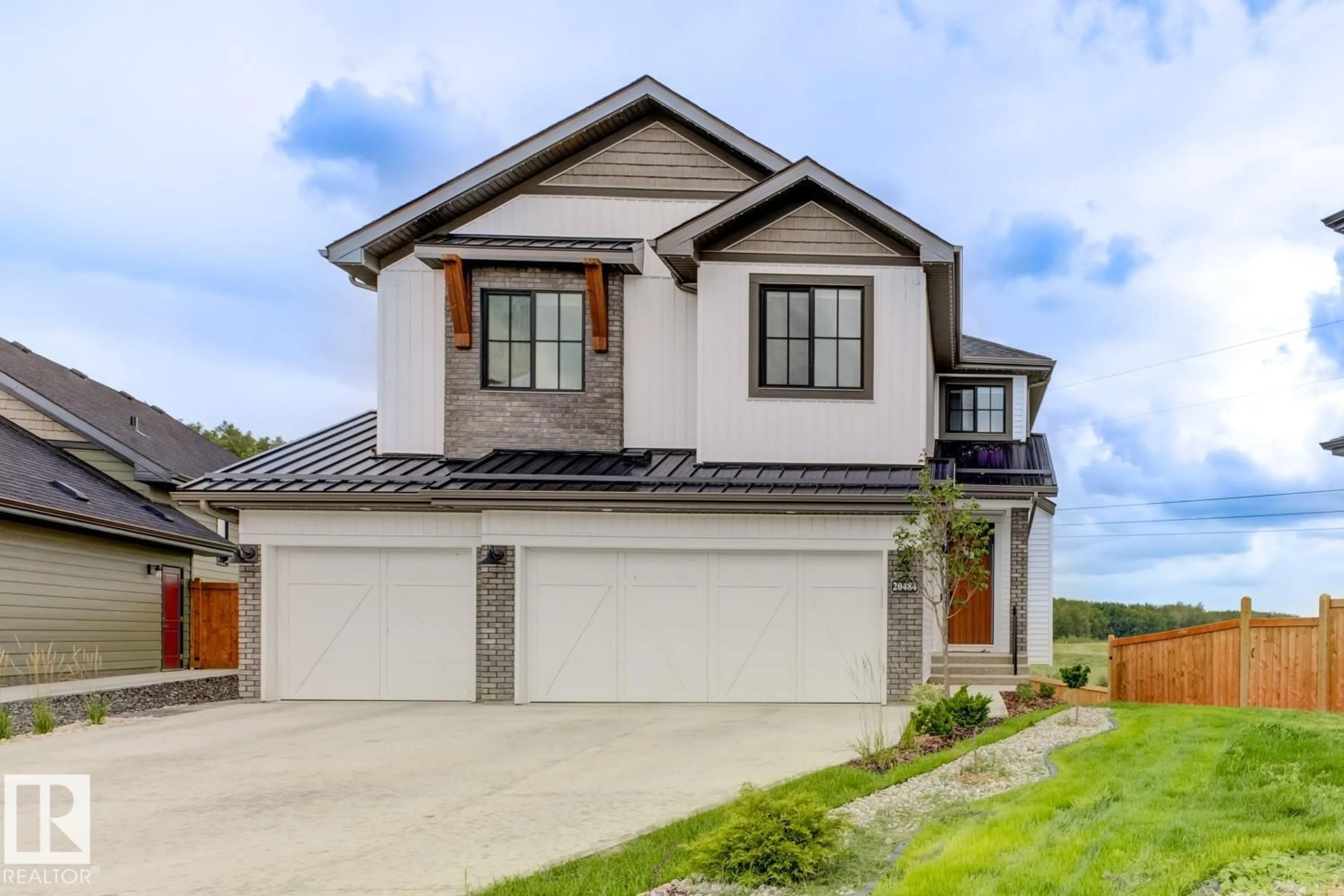 Home with brick exterior material, street for 20484 128 AV, Edmonton Alberta T5S0G1