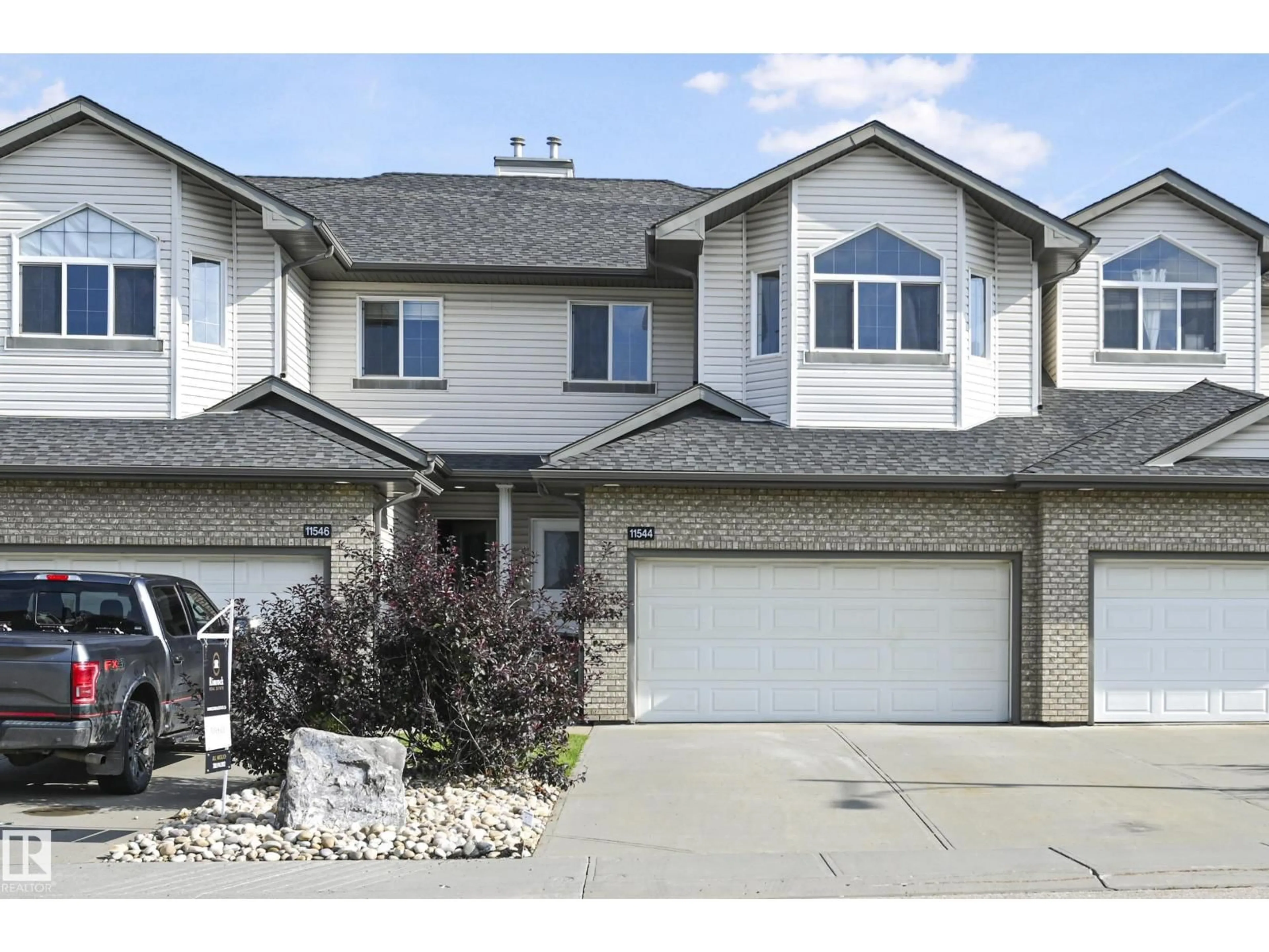 Home with vinyl exterior material, street for SW - 11544 11 AV, Edmonton Alberta T6W1W8