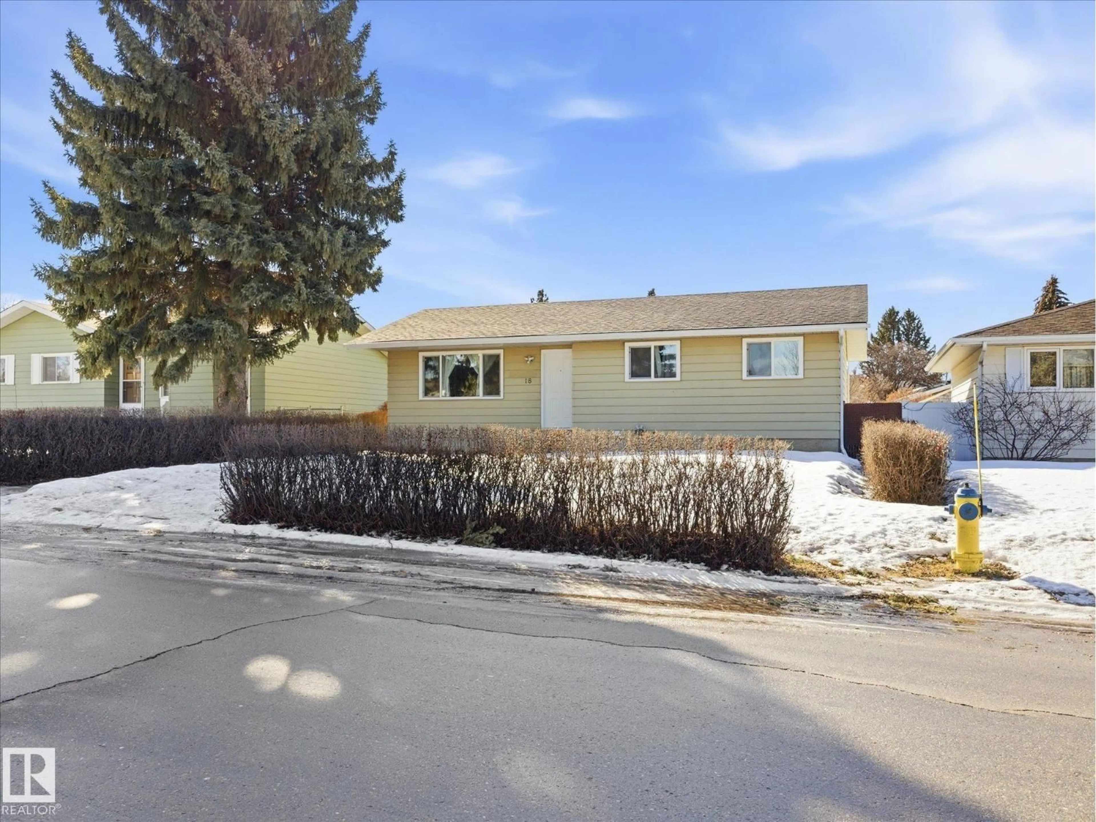 Home with vinyl exterior material, street for 18 MILLER AV, Spruce Grove Alberta T7X2N2