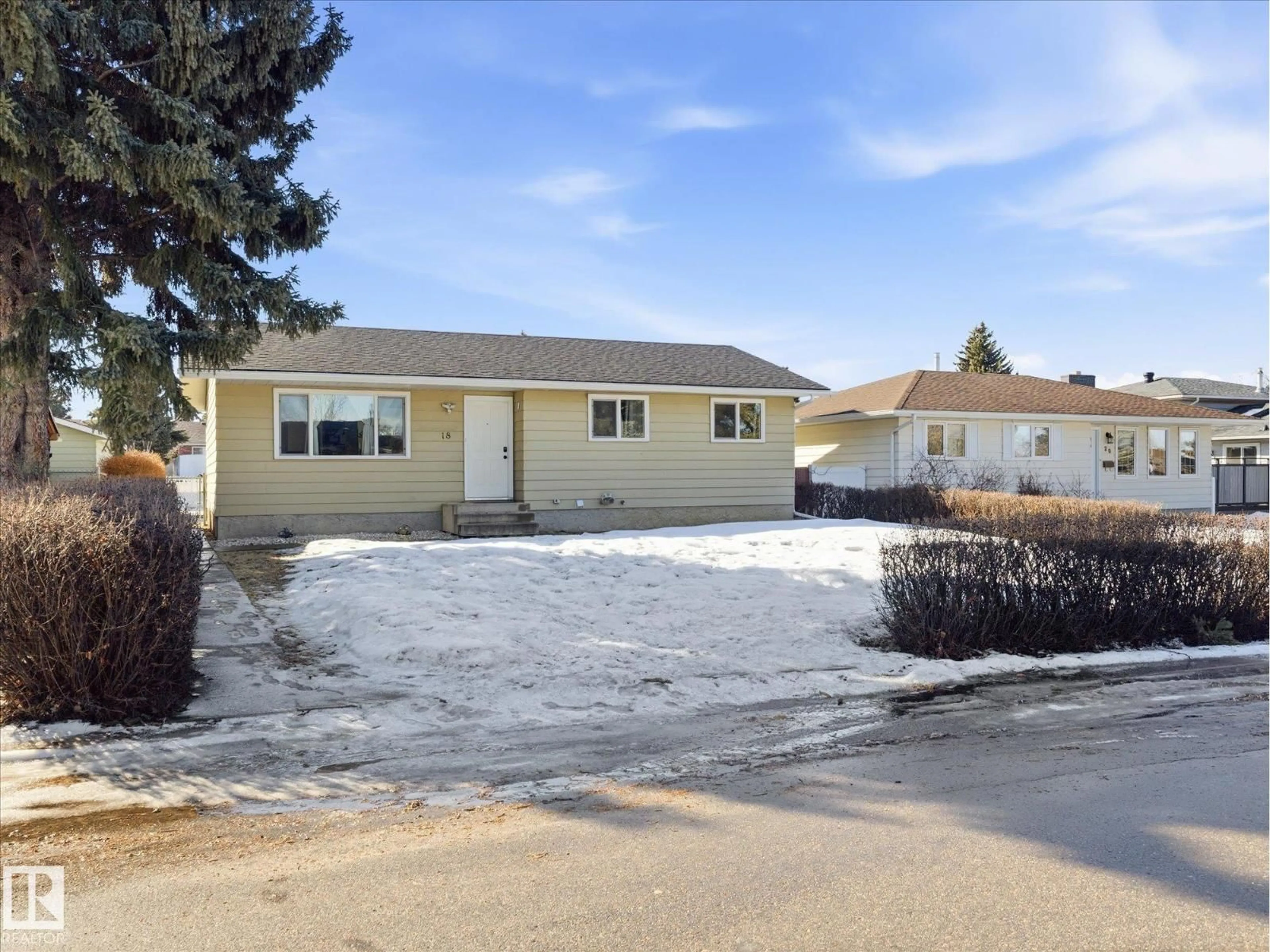 Home with vinyl exterior material, street for 18 MILLER AV, Spruce Grove Alberta T7X2N2