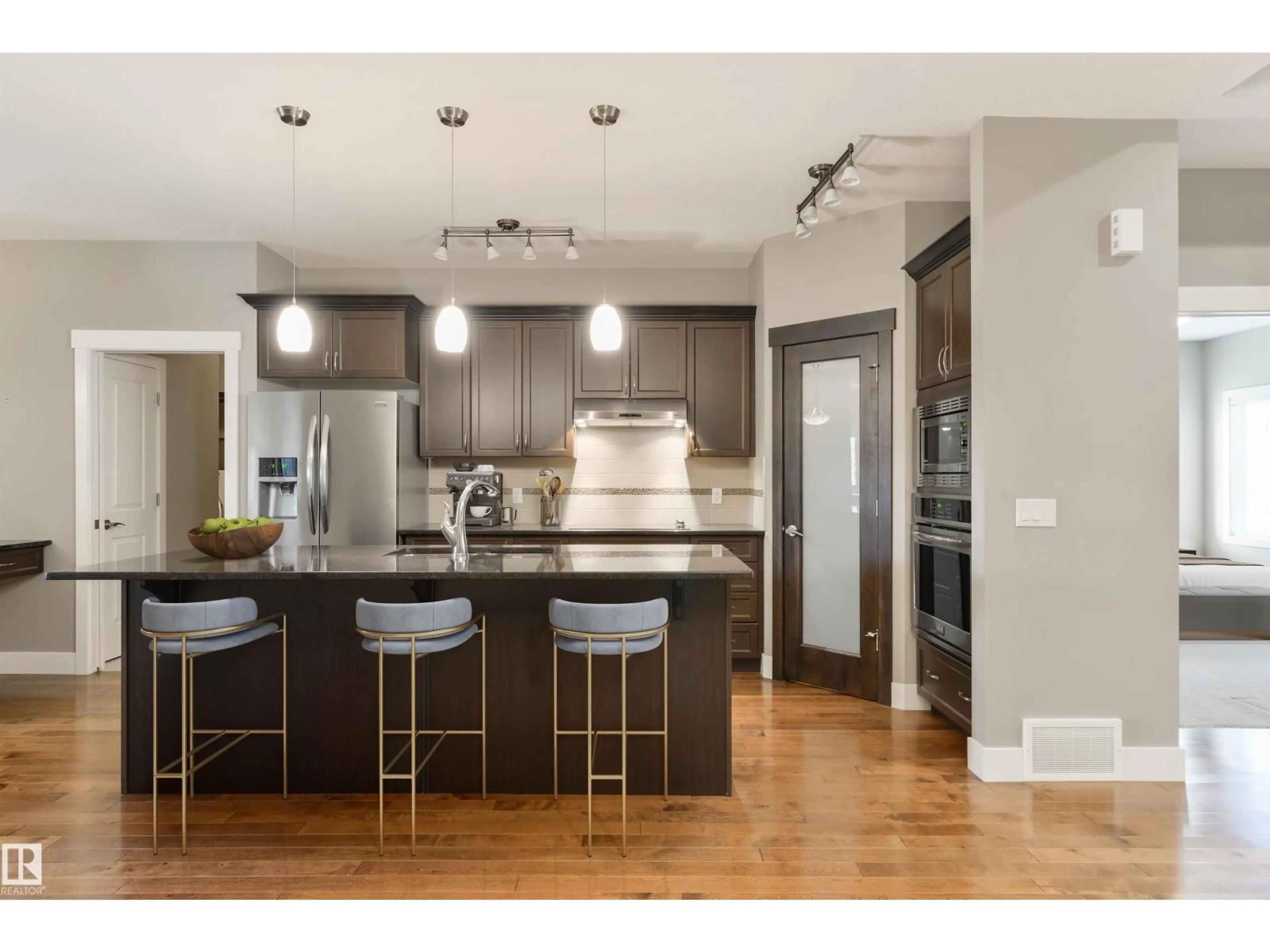 Open concept kitchen, wood/laminate floor for #132 - 132 HEATHERGLEN DR, Spruce Grove Alberta T7X0R6