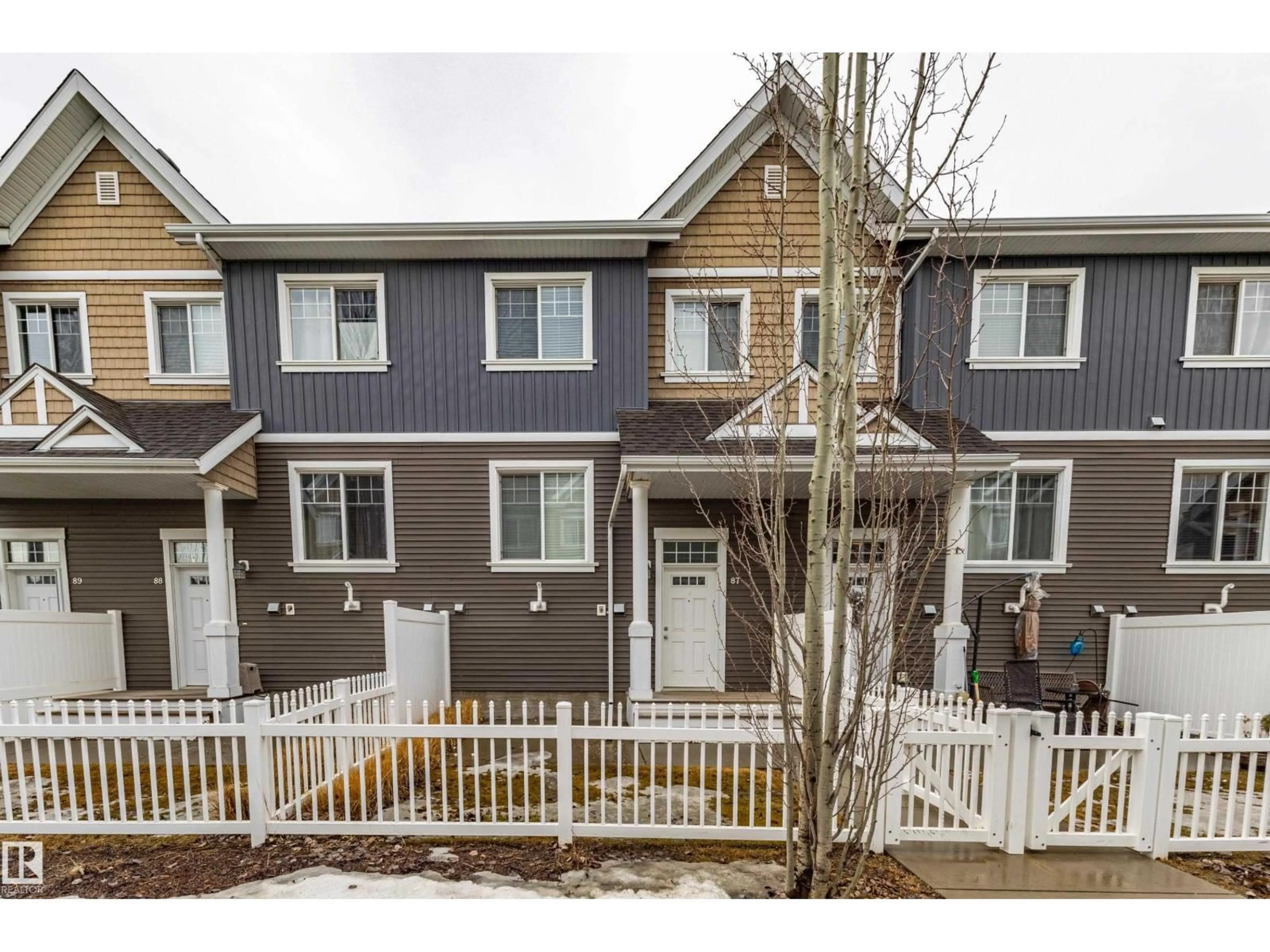 A pic from outside/outdoor area/front of a property/back of a property/a pic from drone, street for #87 - 4050 SAVARYN DR, Edmonton Alberta T6X1R8