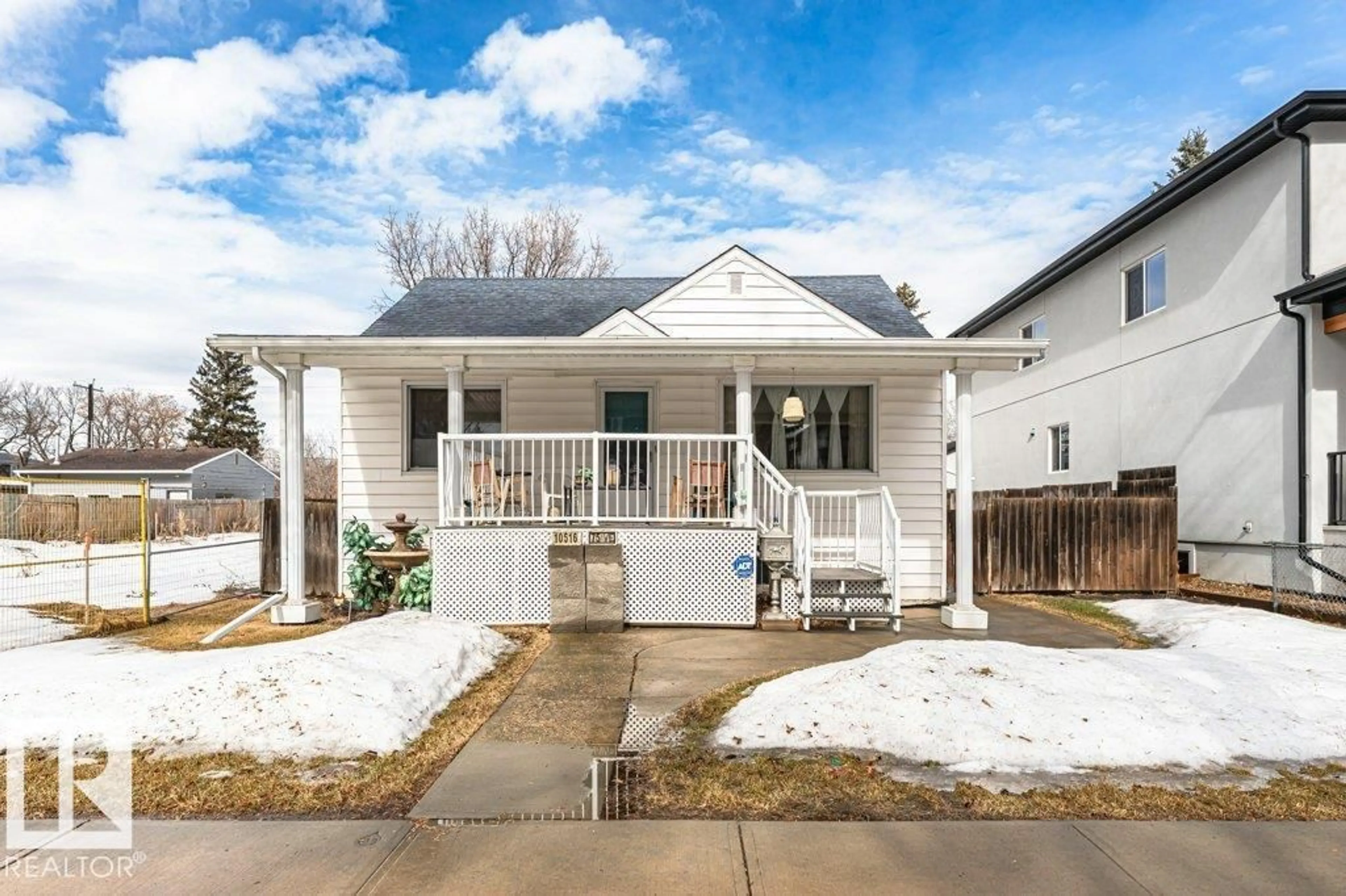 Home with vinyl exterior material, street for 10516 75 AV, Edmonton Alberta T6E1J4