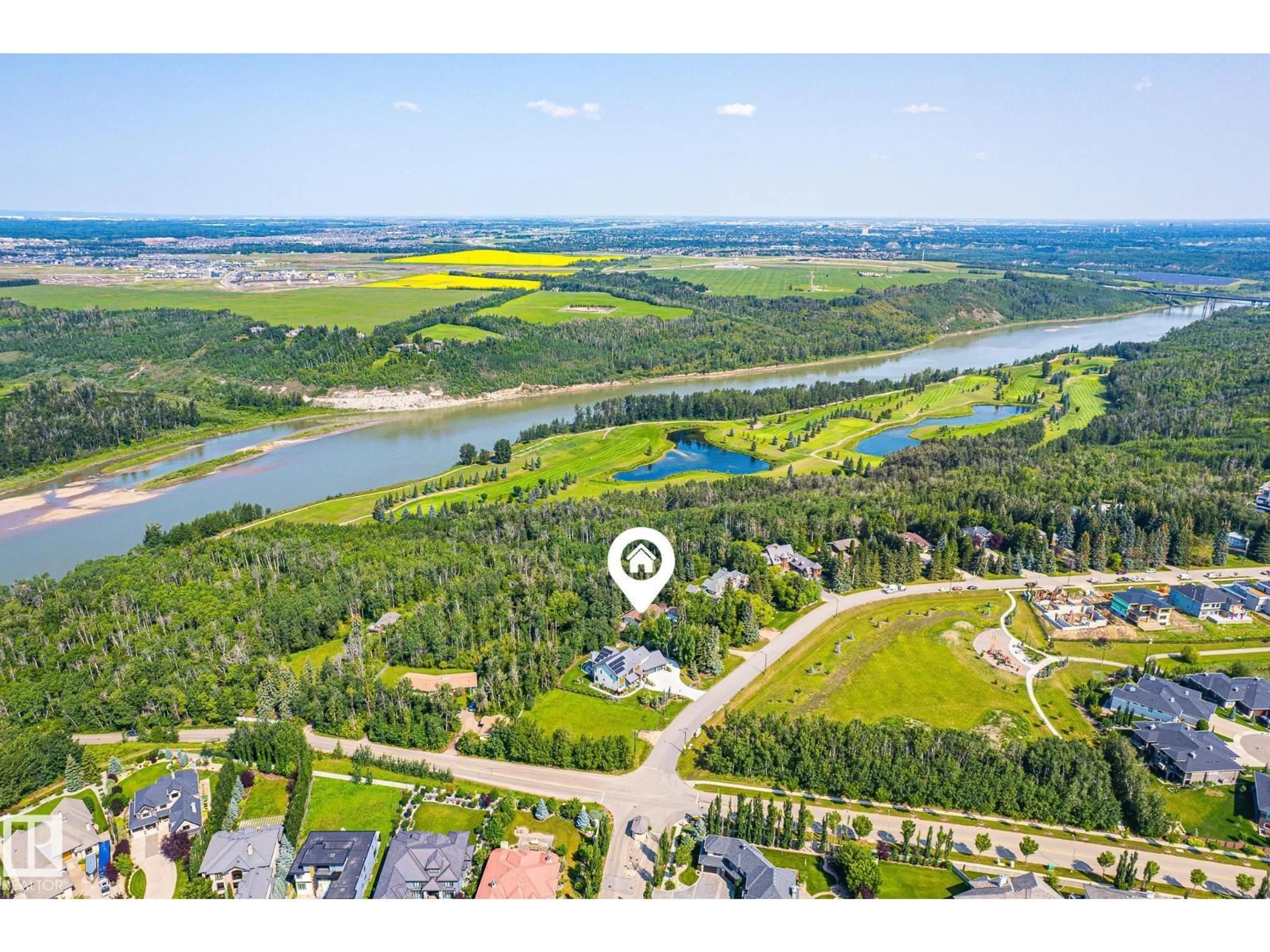 A pic from outside/outdoor area/front of a property/back of a property/a pic from drone, water/lake/river/ocean view for 108 WINDERMERE DR, Edmonton Alberta T6W0S4