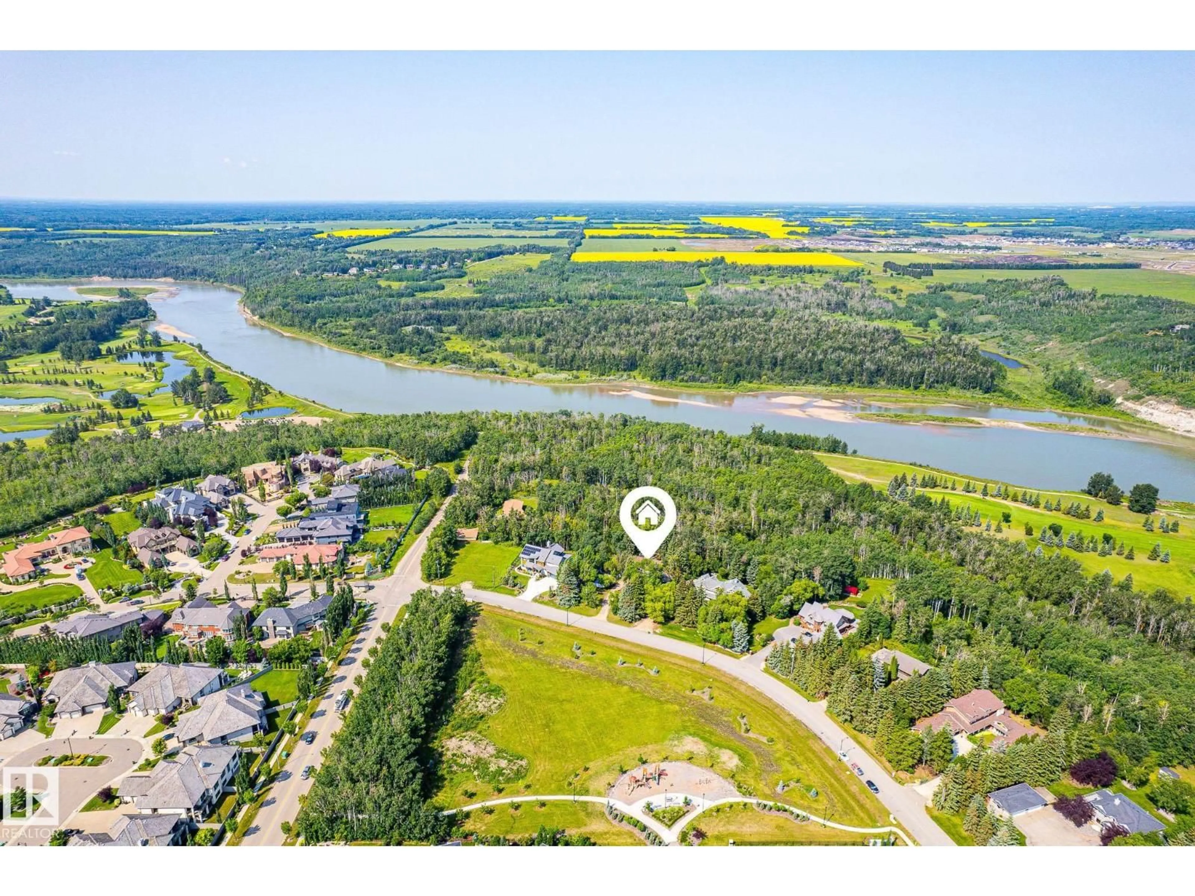 A pic from outside/outdoor area/front of a property/back of a property/a pic from drone, water/lake/river/ocean view for 108 WINDERMERE DR, Edmonton Alberta T6W0S4