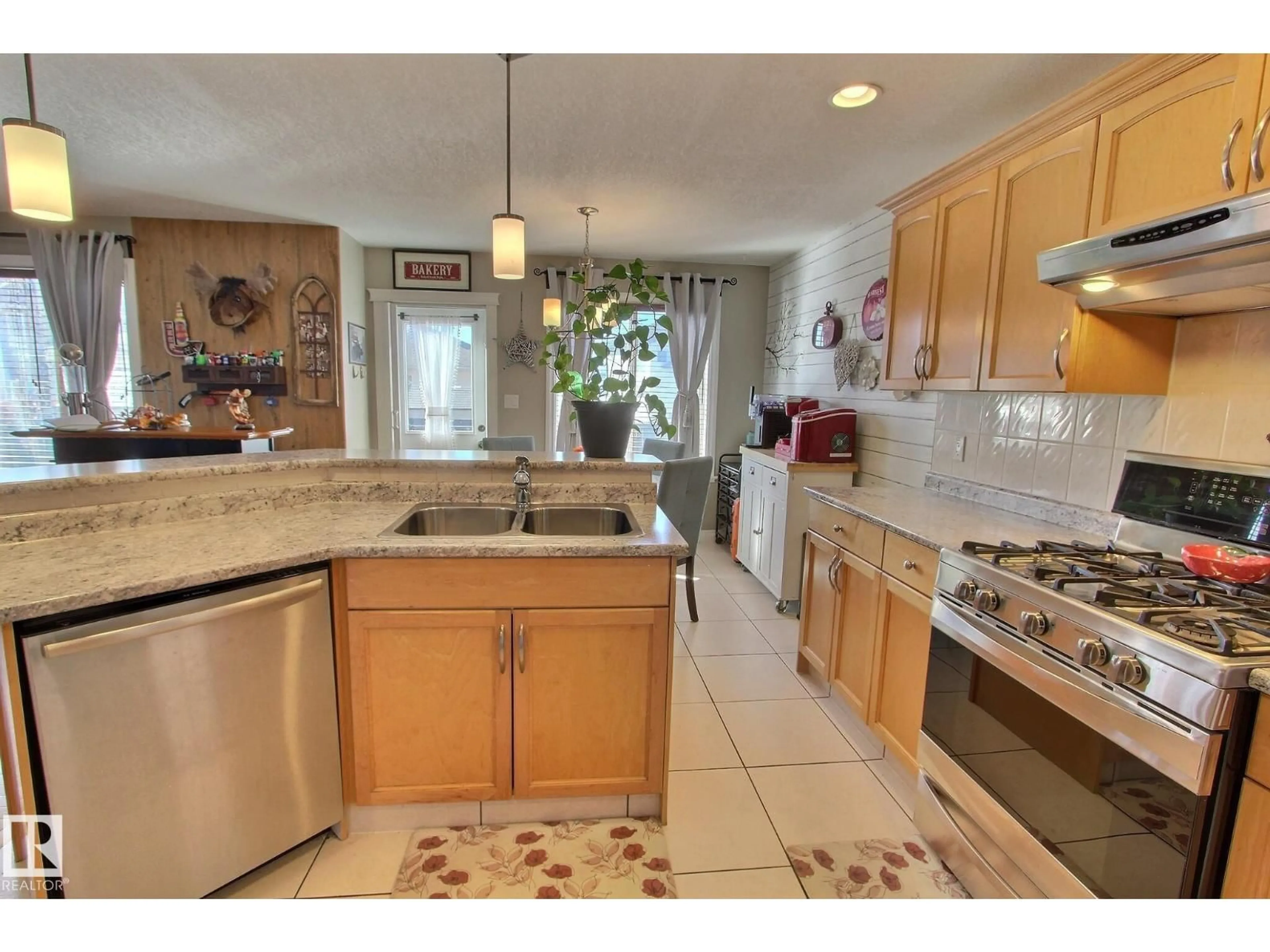 Open concept kitchen, ceramic/tile floor for 12 BIRCHMONT CR, Leduc Alberta T9E8S3