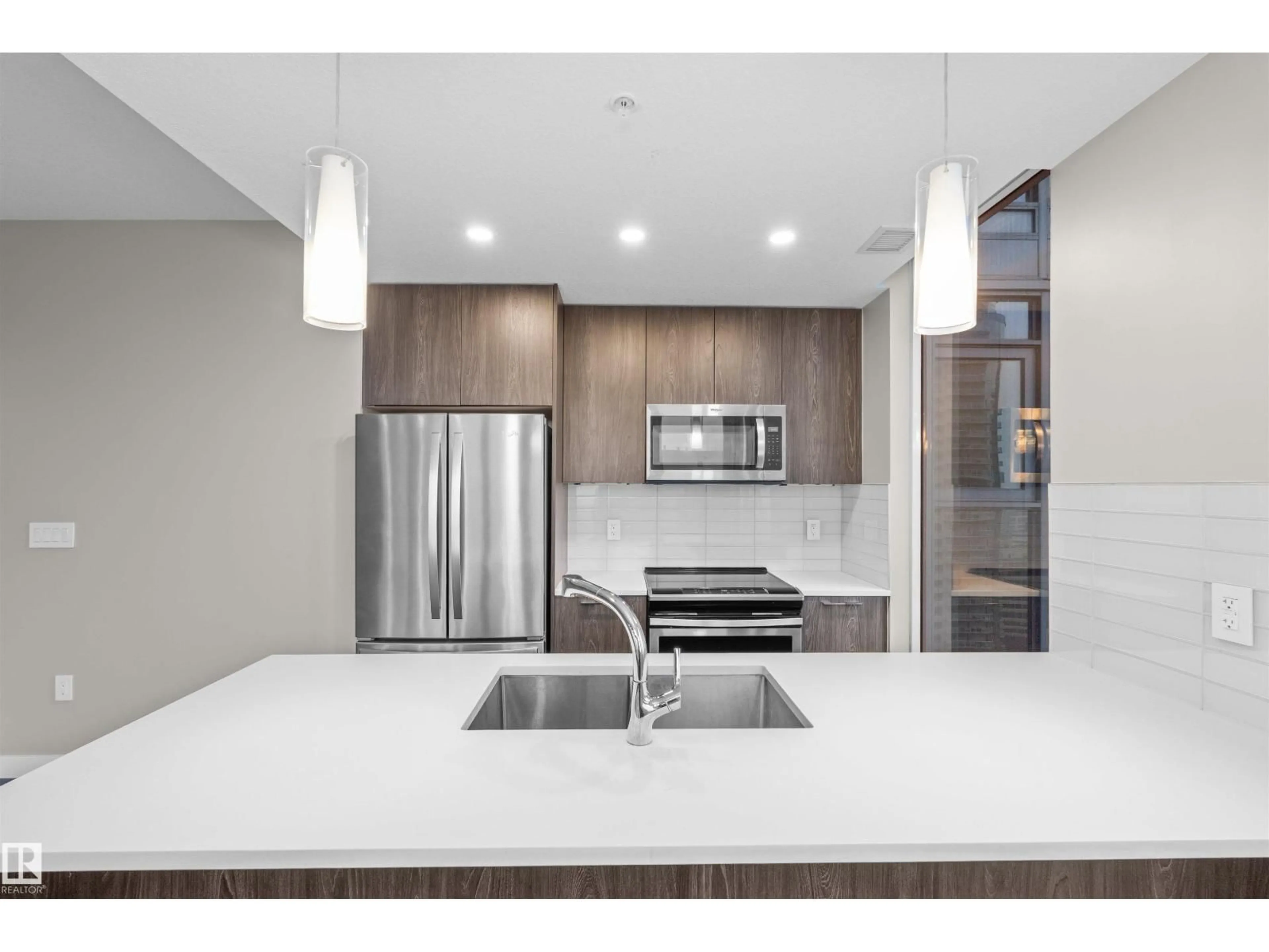 Open concept kitchen, unknown for 2201 10180 103 ST NW, Edmonton Alberta T5J0L1