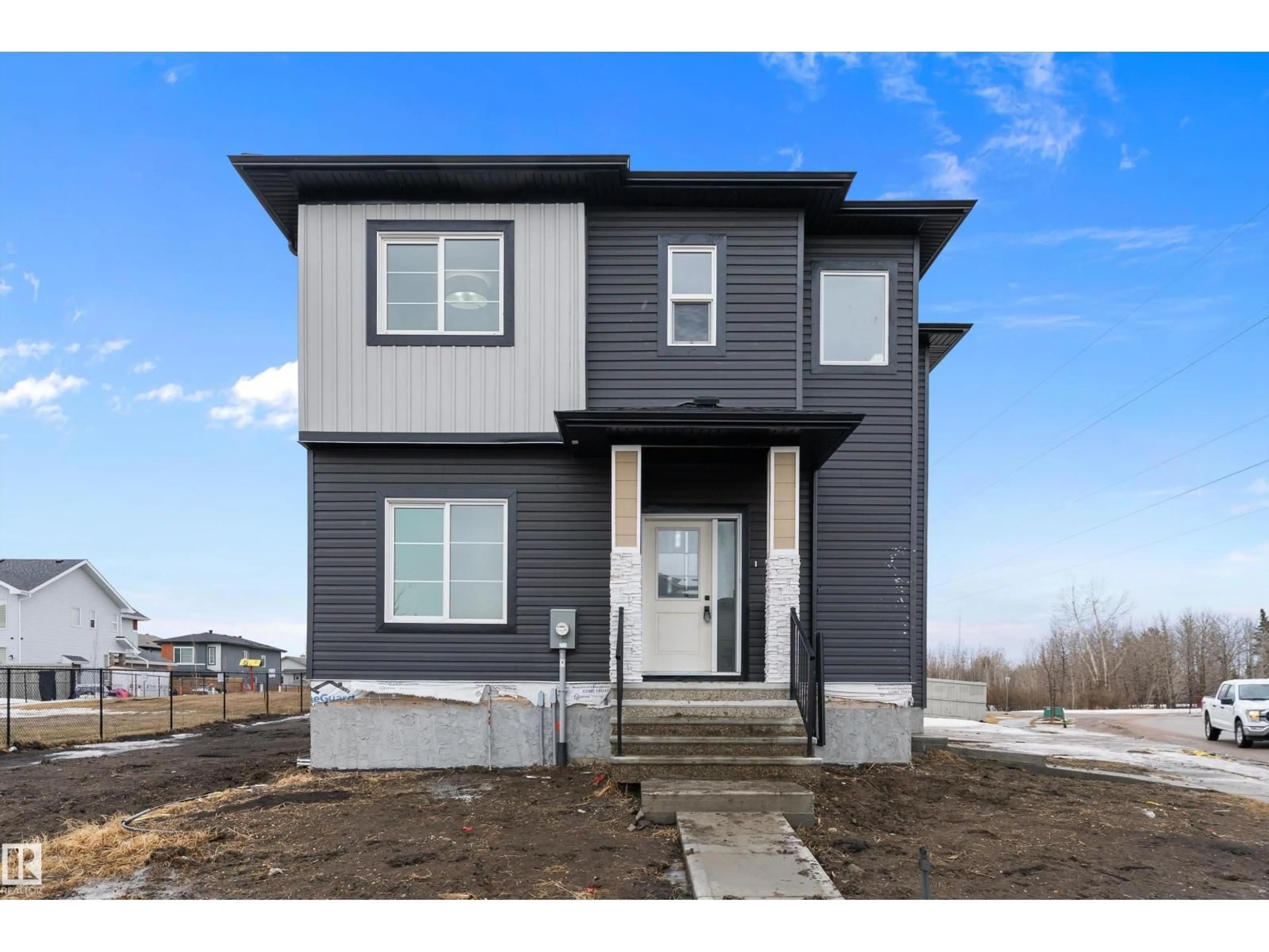 Home with vinyl exterior material, street for 292 FRASER WY, Edmonton Alberta T5Y6C4