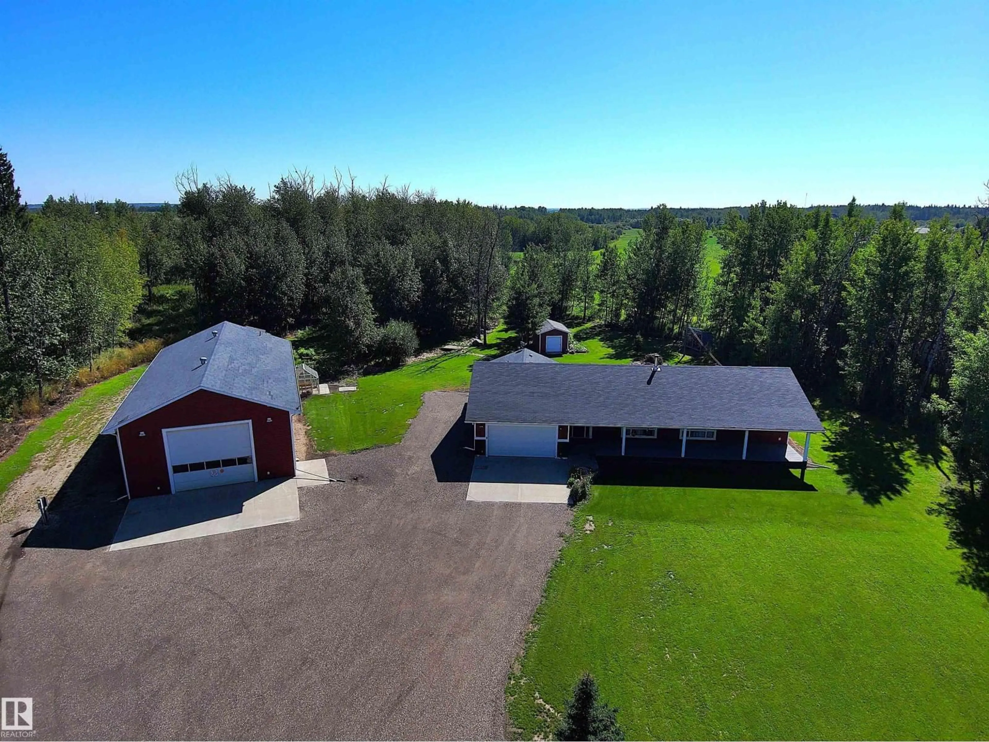 A pic from outside/outdoor area/front of a property/back of a property/a pic from drone, building for 55101 RGE ROAD 25, Rural Lac Ste. Anne County Alberta T0E1V0