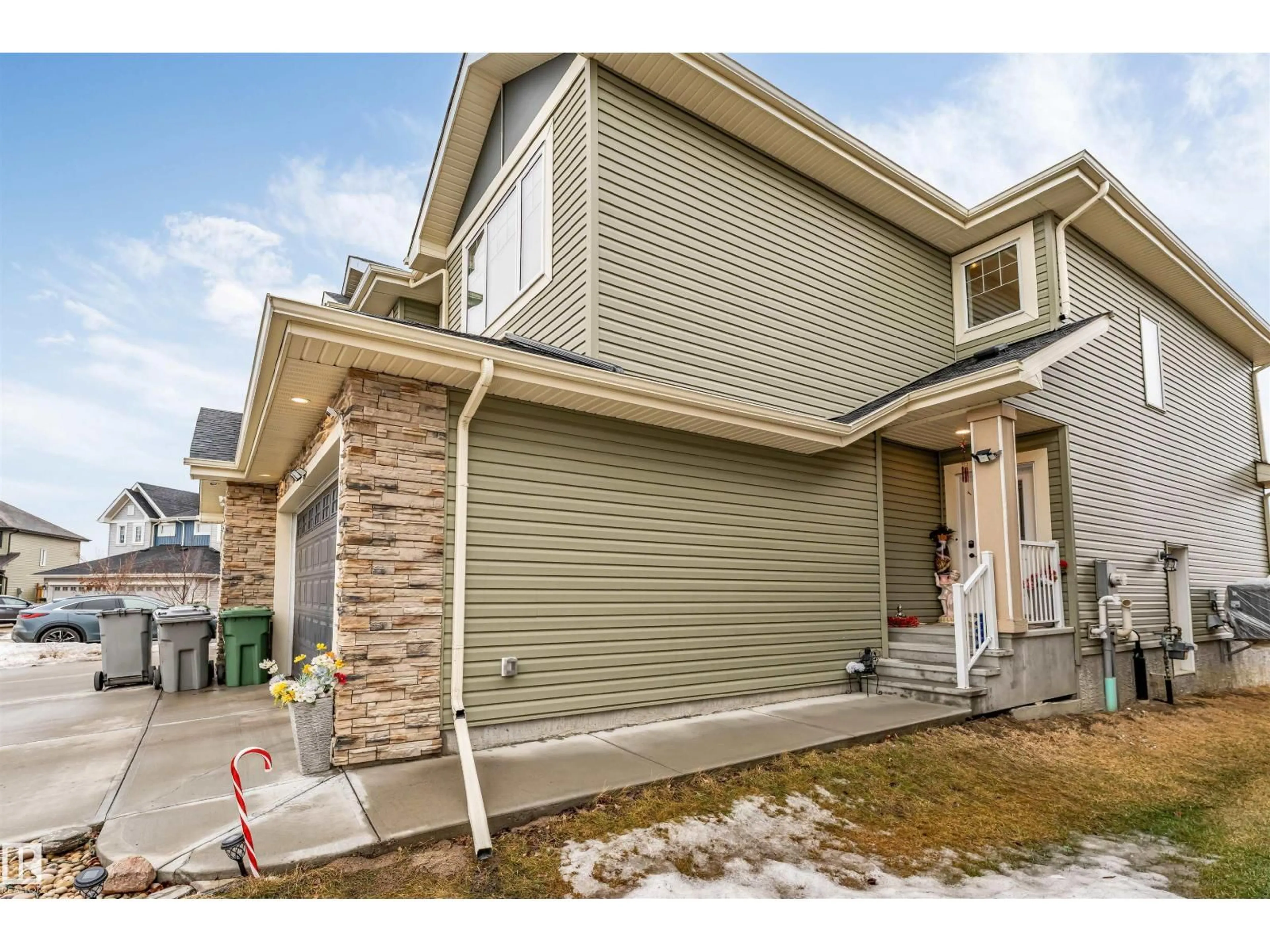 Home with vinyl exterior material, street for 5708 66 ST, Beaumont Alberta T4X2A4