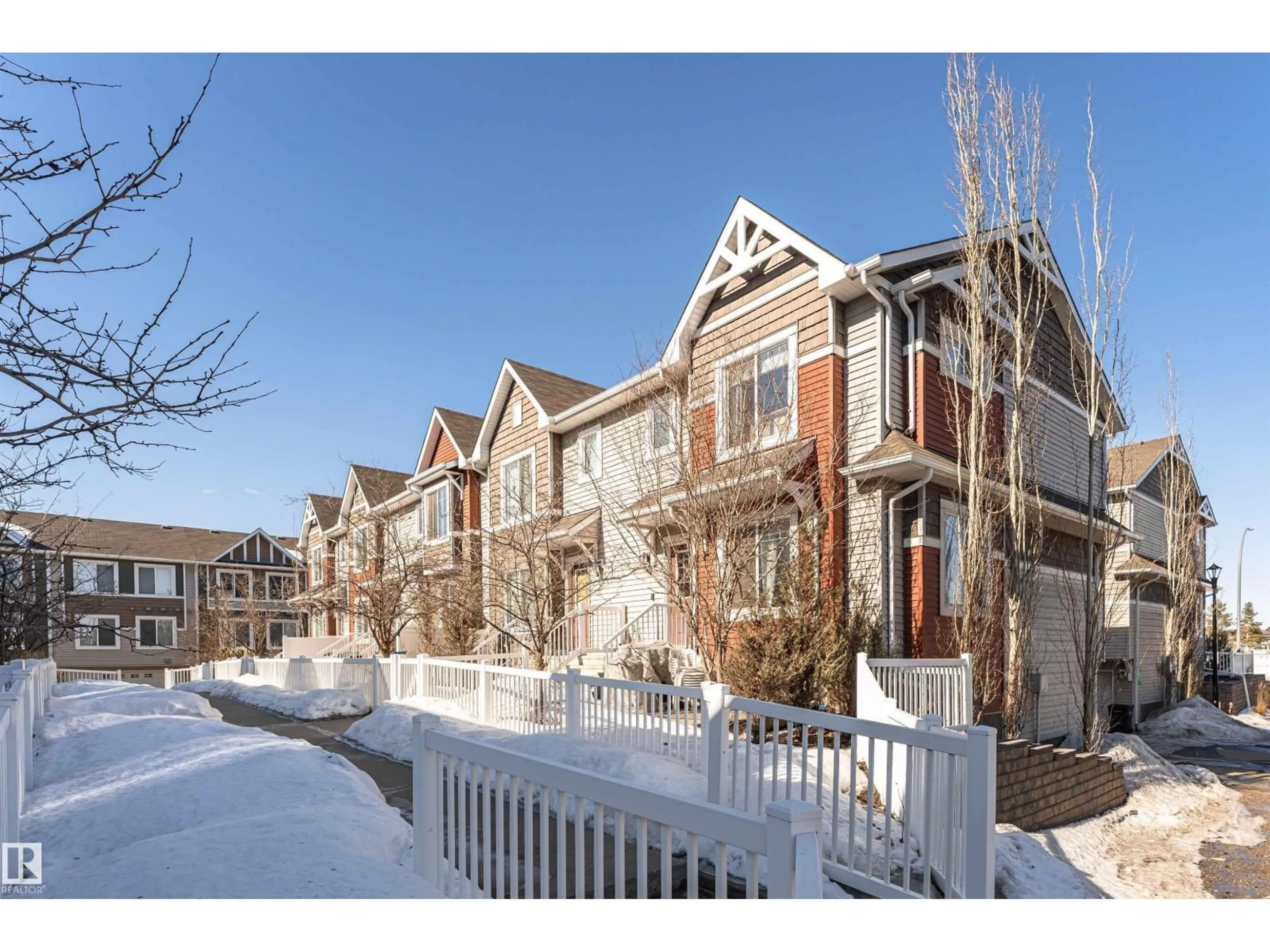 A pic from outside/outdoor area/front of a property/back of a property/a pic from drone, street for #110 - 3625 144 AV, Edmonton Alberta T5Y0T3