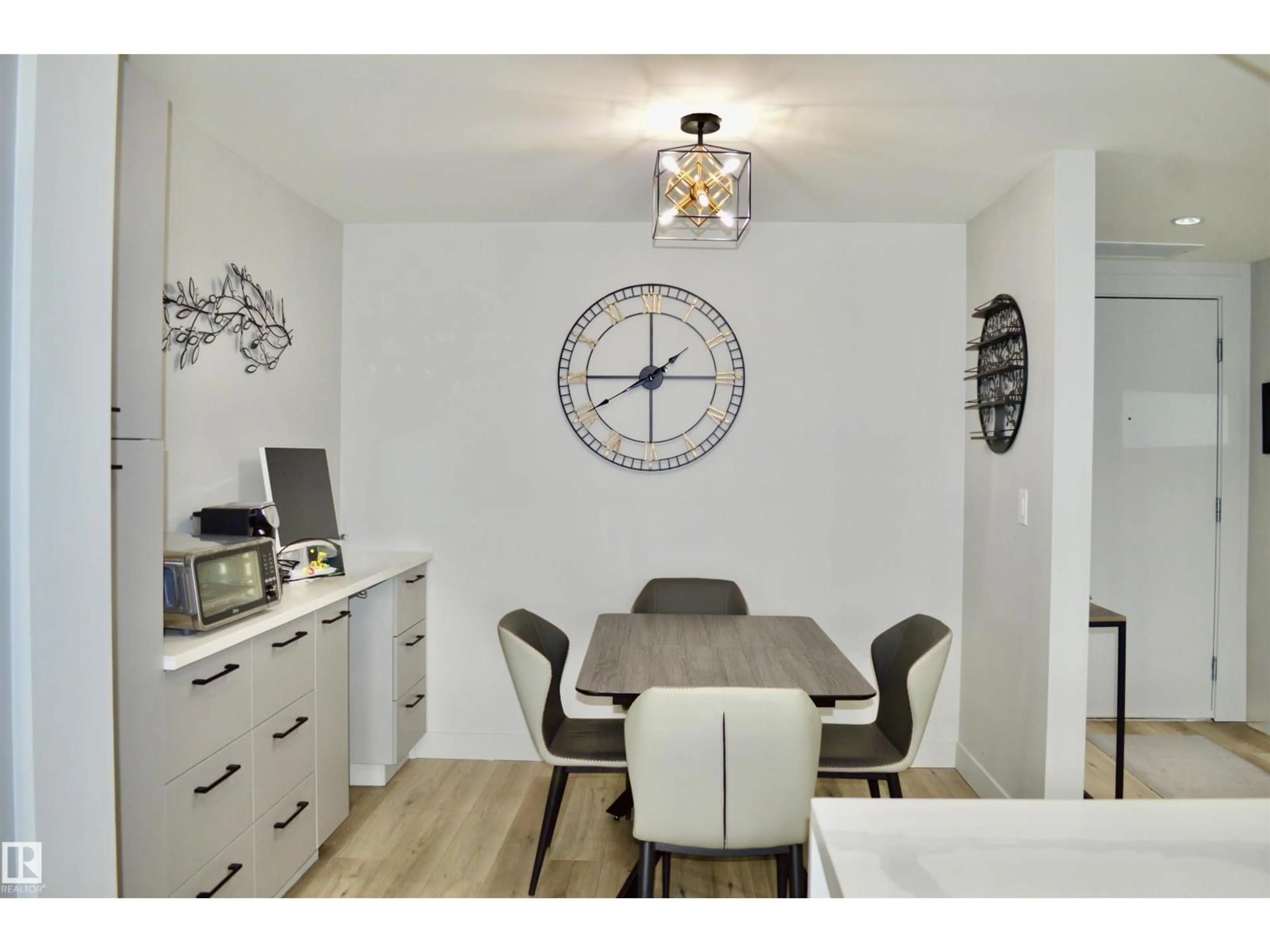 Dining room, wood/laminate floor for #703 - 2606 109 ST, Edmonton Alberta T6J3S9