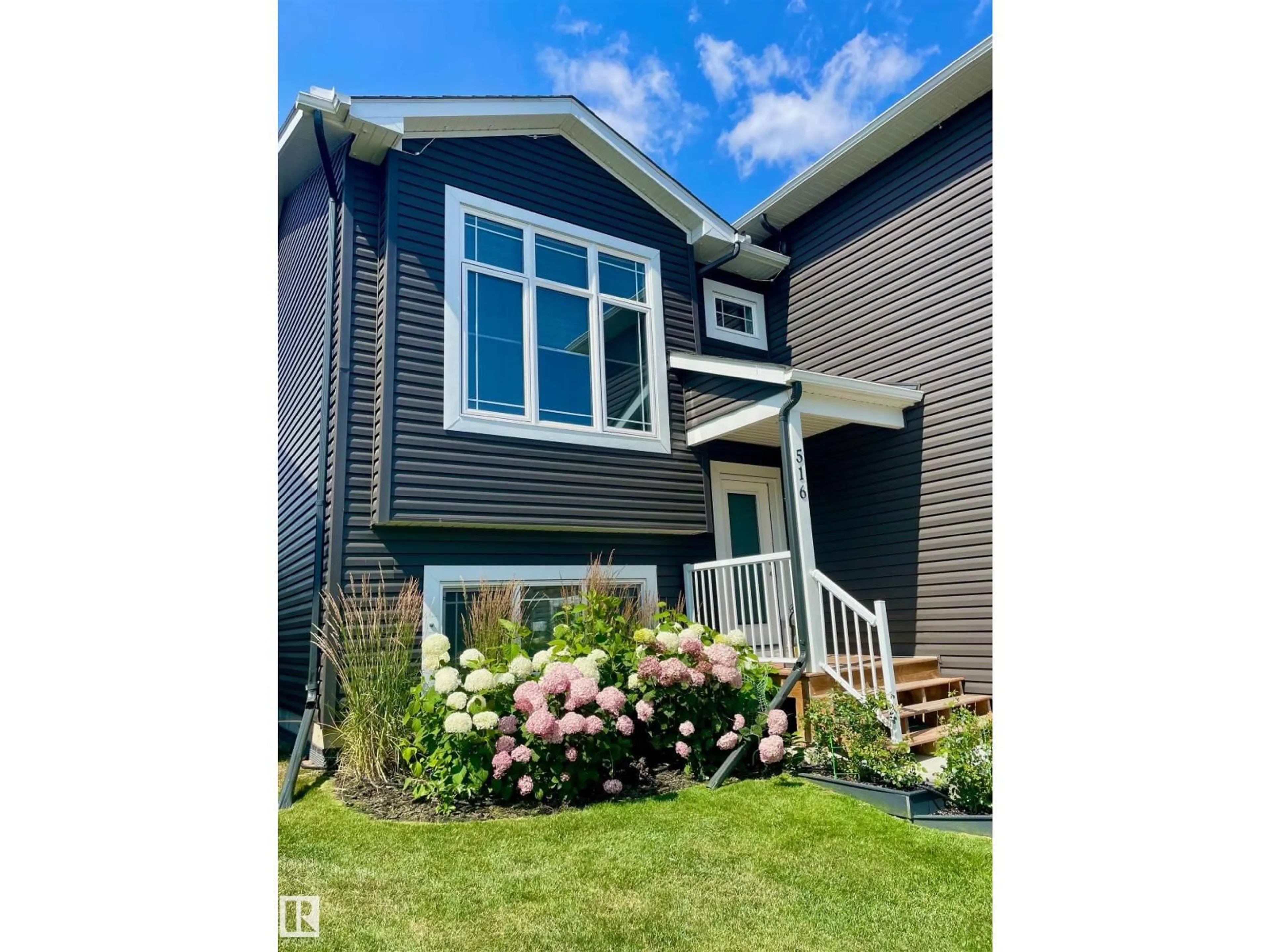 Home with vinyl exterior material, street for 516 18 ST, Cold Lake Alberta T9M0K3