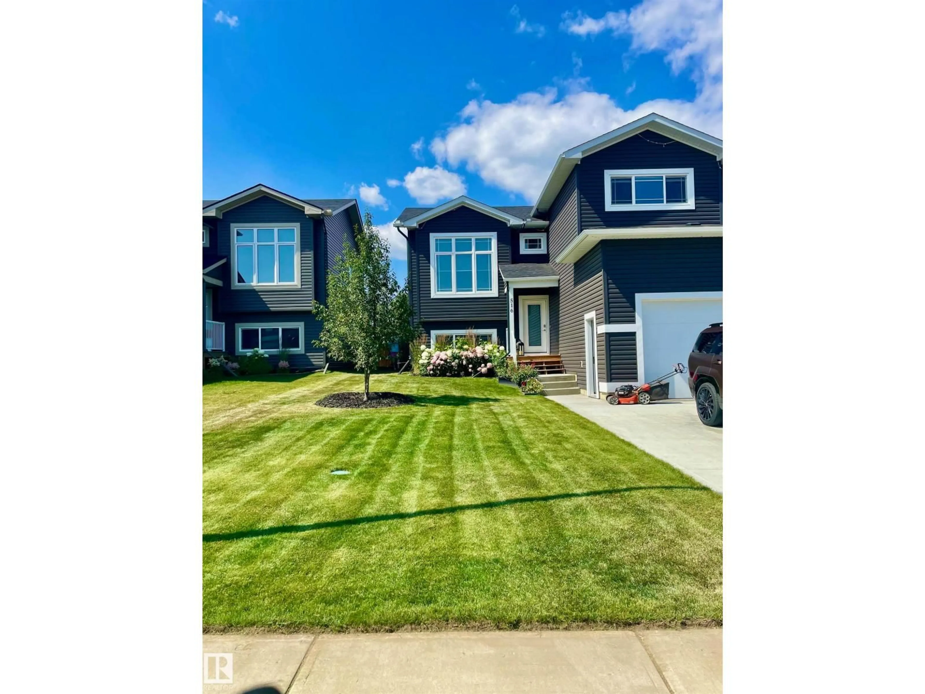 Home with vinyl exterior material, street for 516 18 ST, Cold Lake Alberta T9M0K3