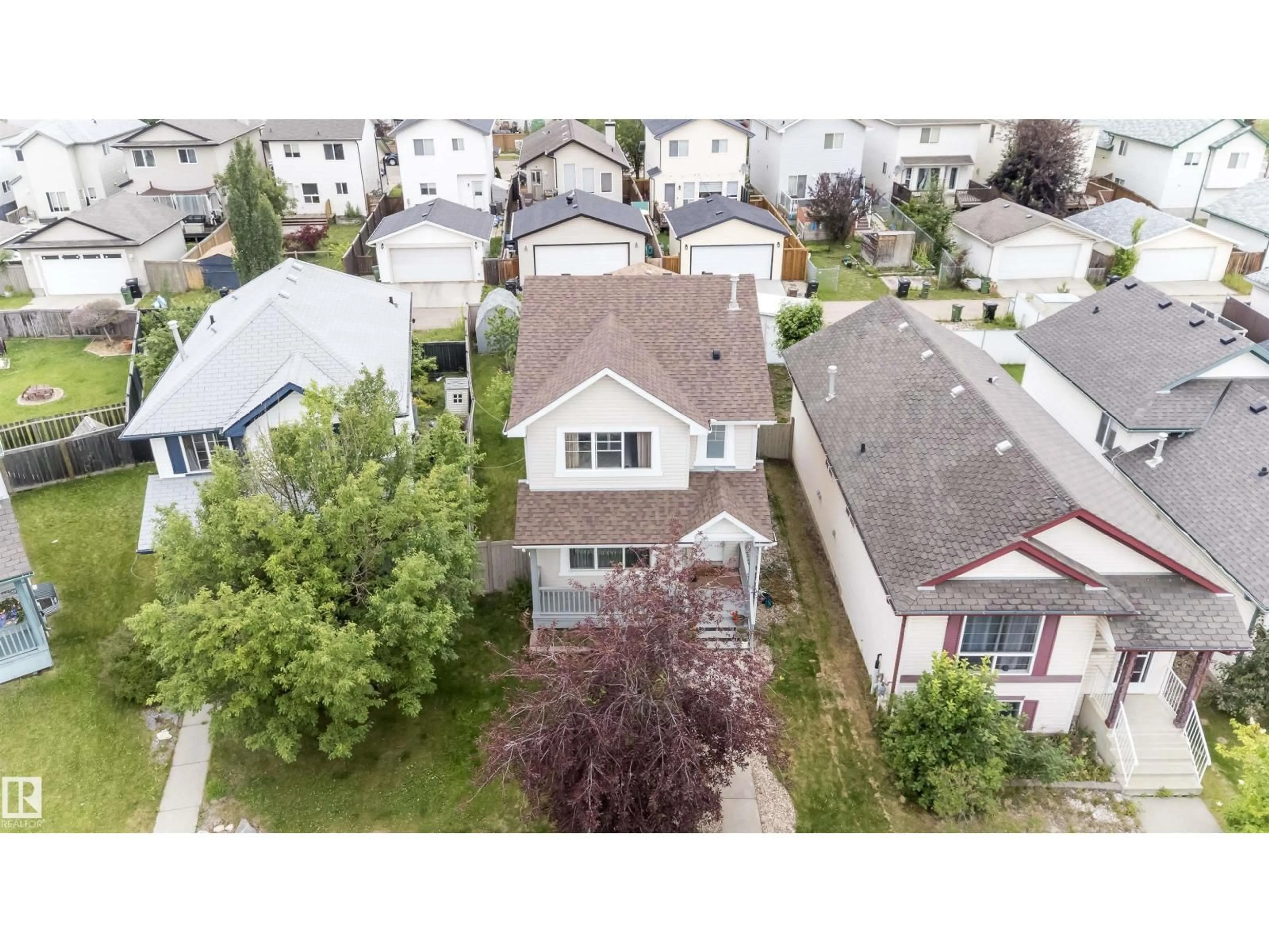 A pic from outside/outdoor area/front of a property/back of a property/a pic from drone, street for 15920 38 ST, Edmonton Alberta T5Y3E9
