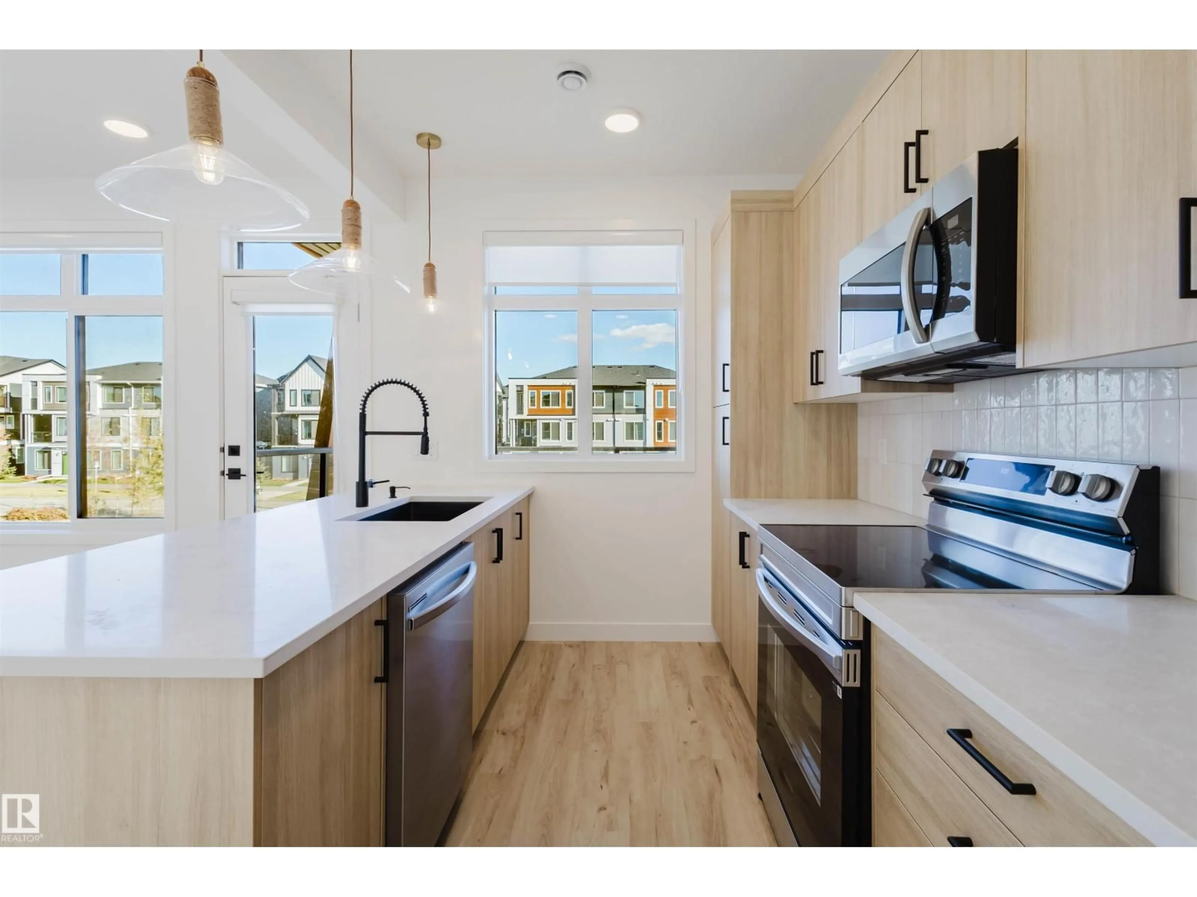 Open concept kitchen, unknown for #23 - 16231 19 AV, Edmonton Alberta T6W5C6