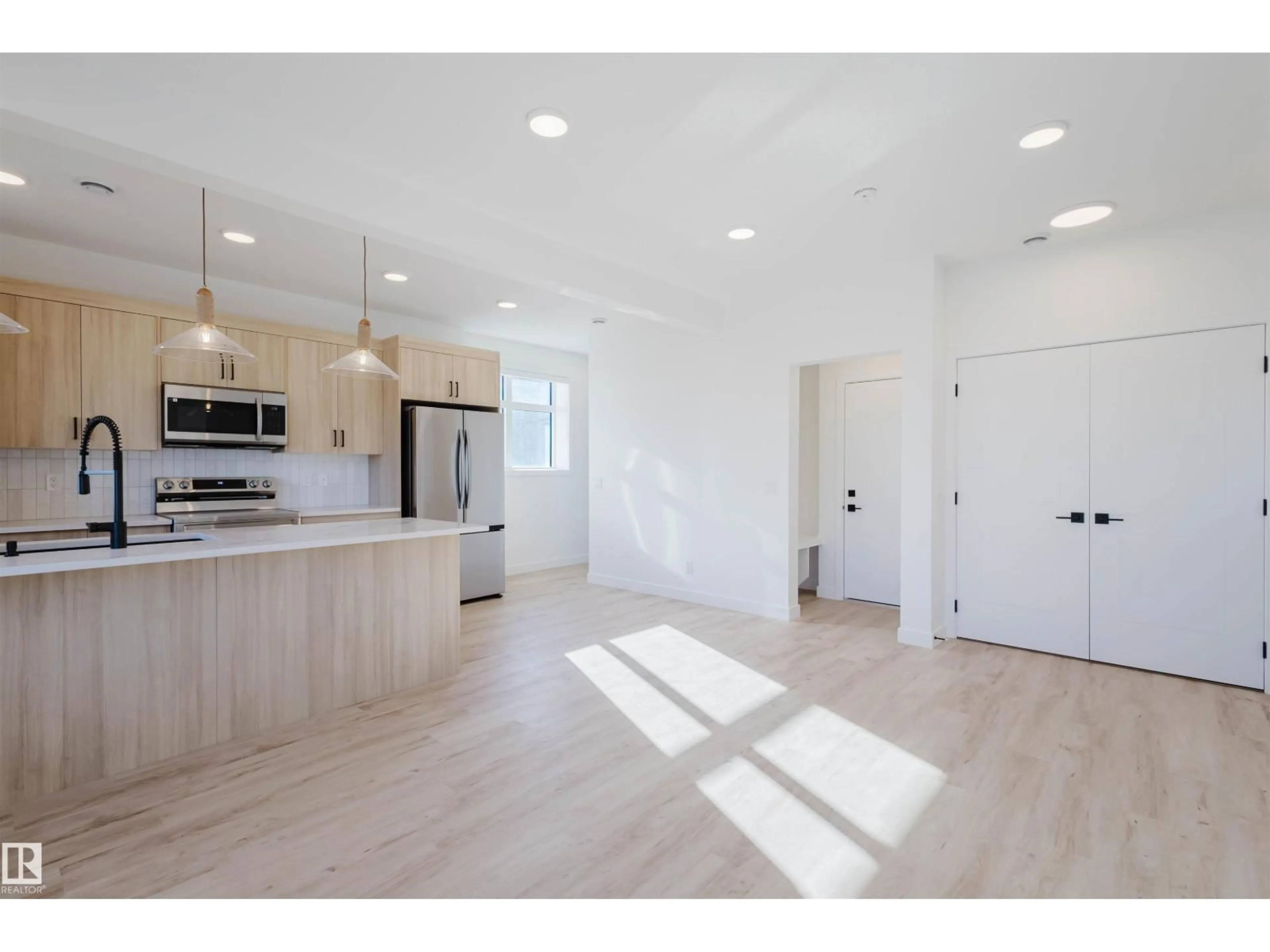 Open concept kitchen, unknown for #23 - 16231 19 AV, Edmonton Alberta T6W5C6