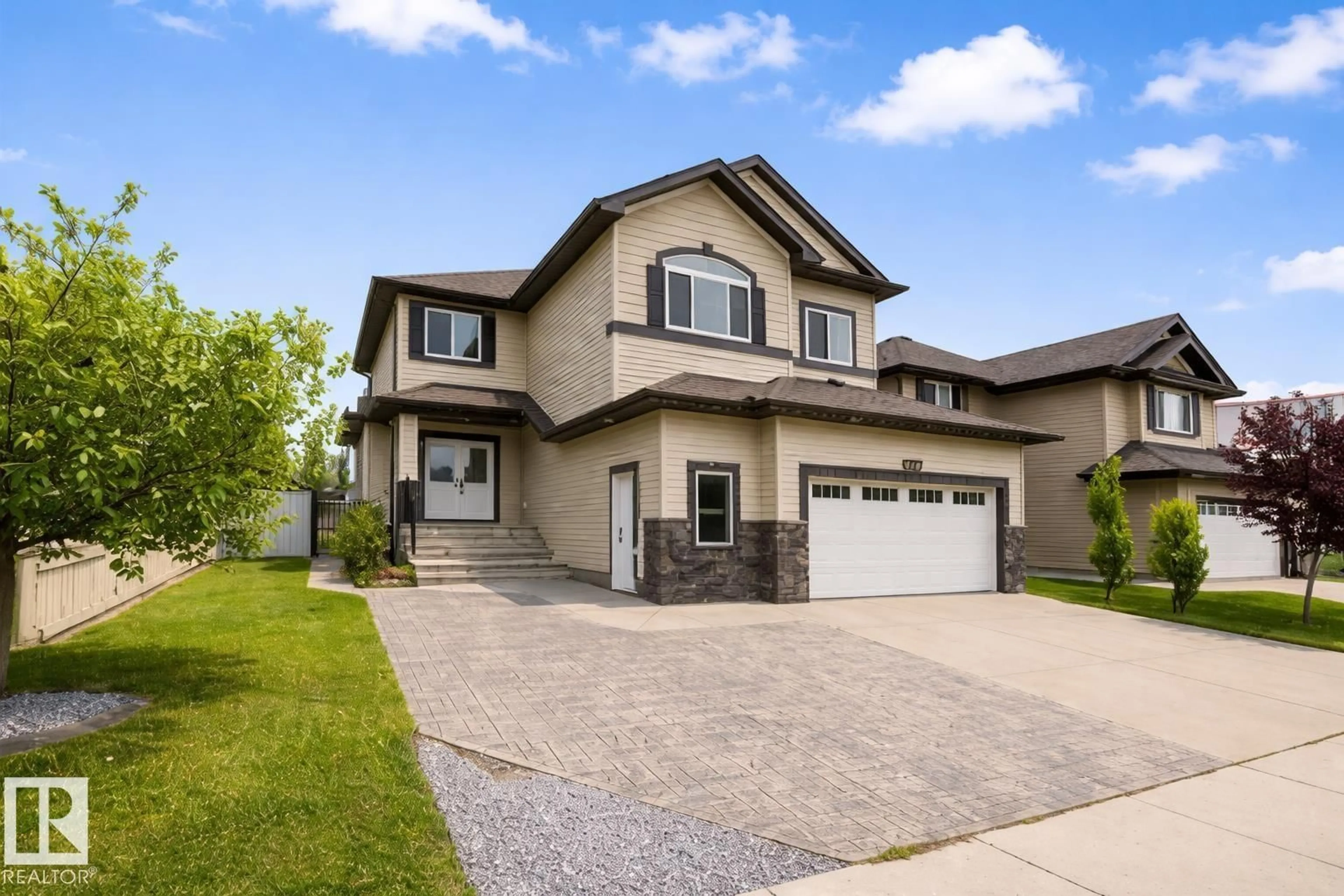 Home with vinyl exterior material, street for 6113 60 ST, Beaumont Alberta T4X0H8