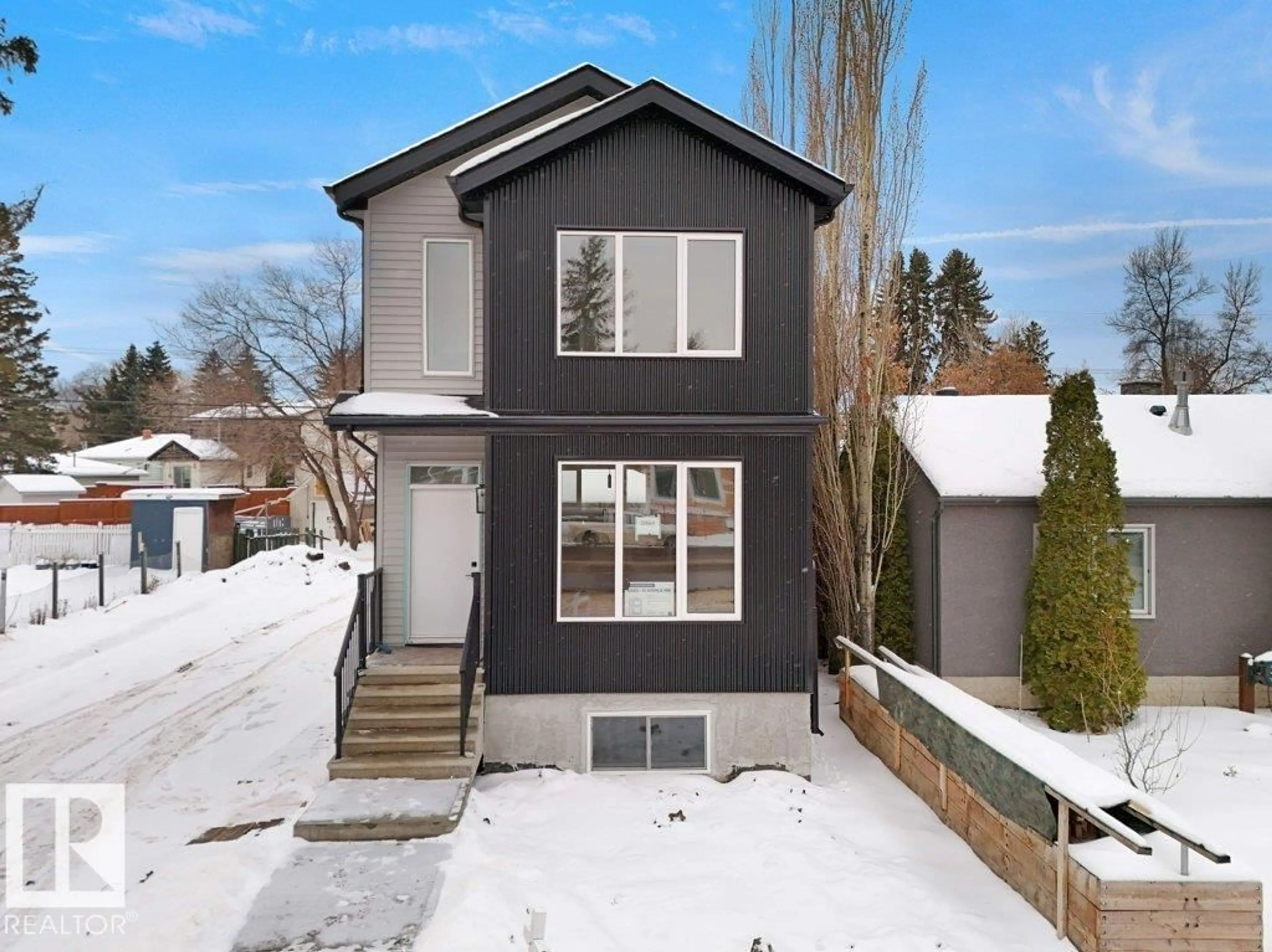 Home with vinyl exterior material, street for 10663 61 AV, Edmonton Alberta T6H1L8