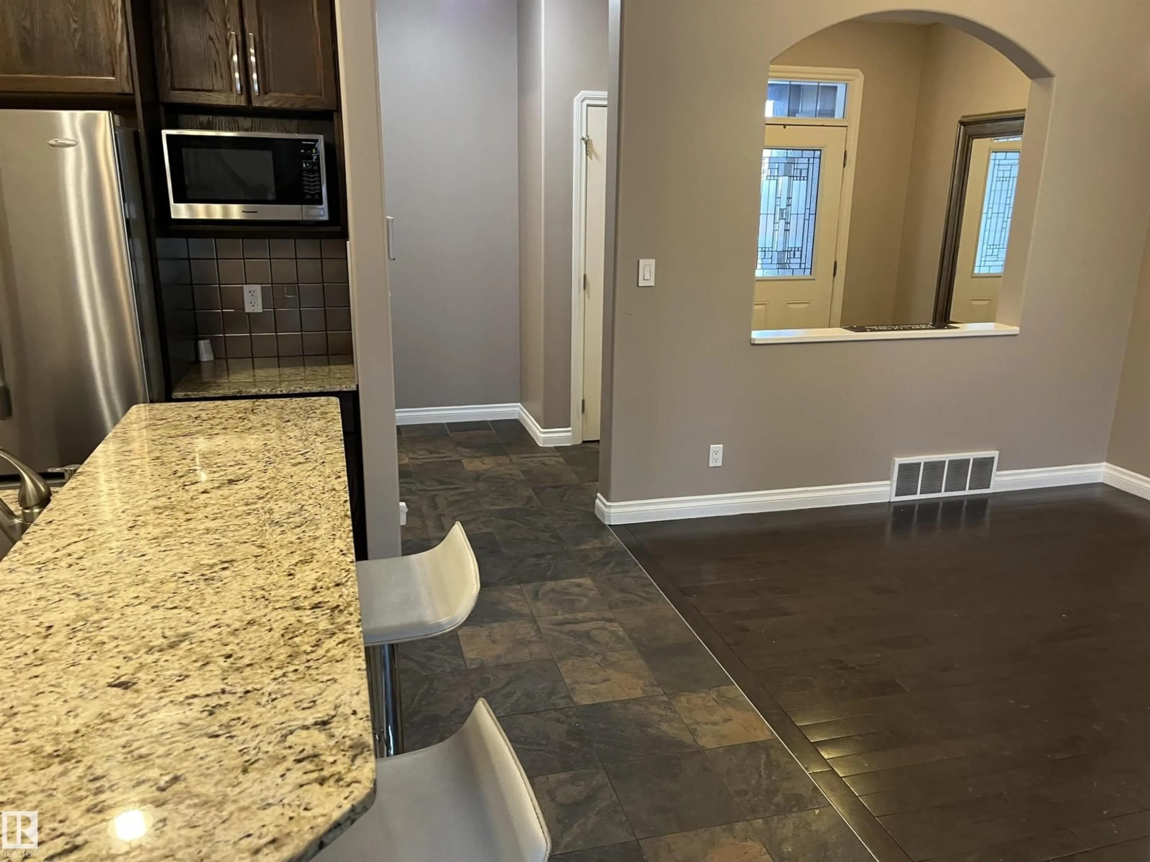 Open concept kitchen, ceramic/tile floor for 21917 95A AV, Edmonton Alberta T5T3Y6