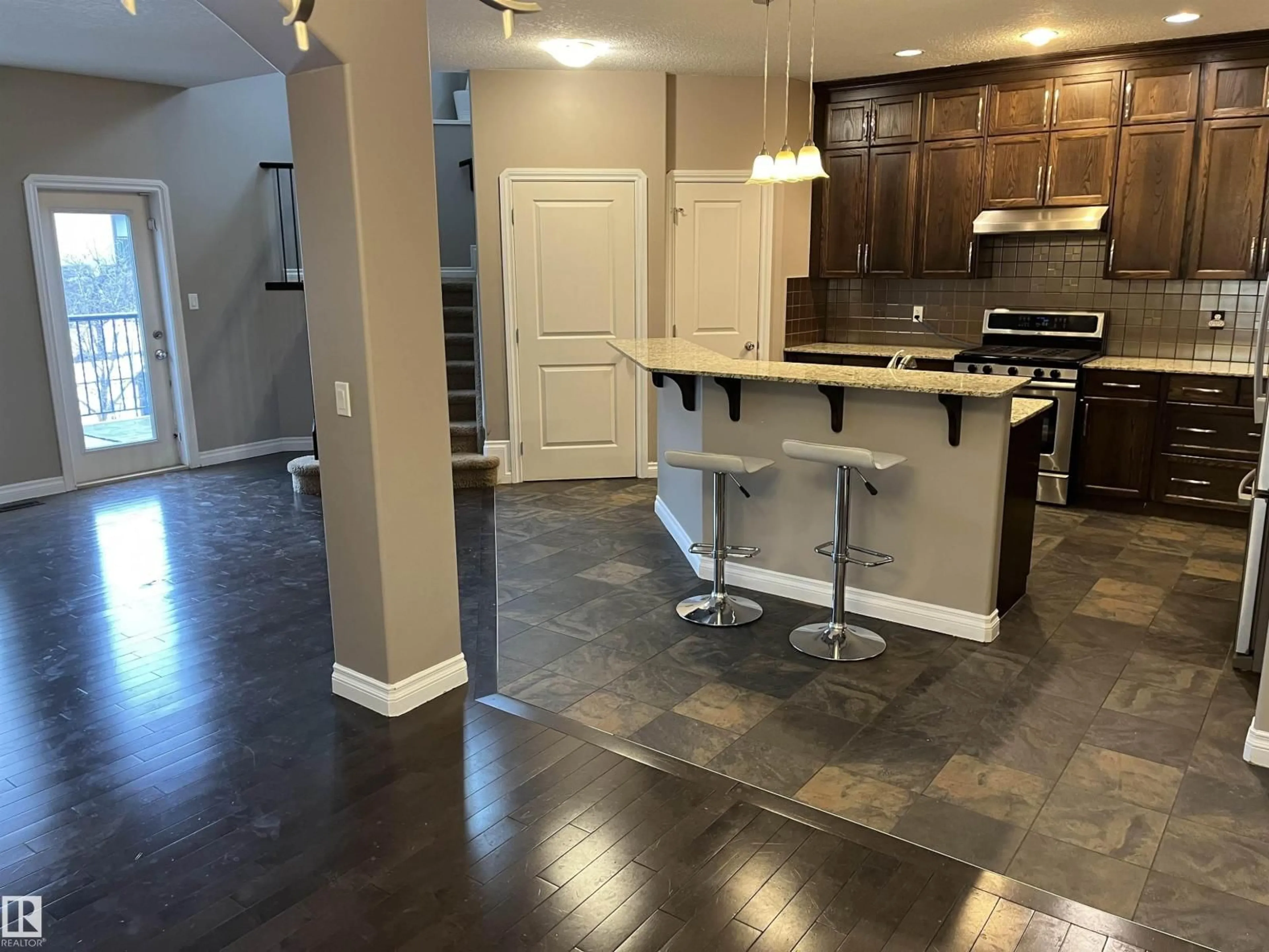 Open concept kitchen, ceramic/tile floor for 21917 95A AV, Edmonton Alberta T5T3Y6