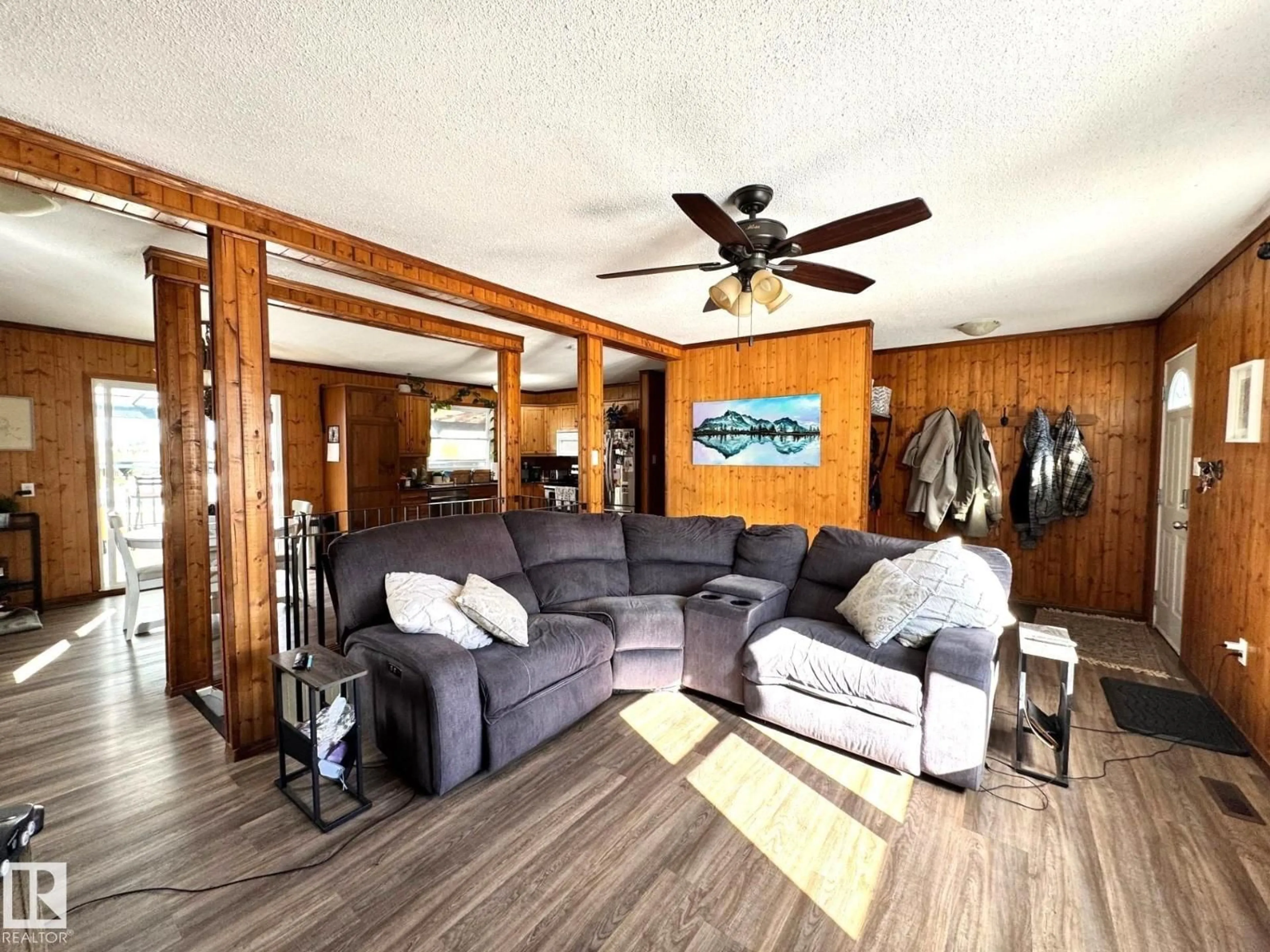 Living room with furniture, wood/laminate floor for 4714 48 AV, Evansburg Alberta T0E0T0