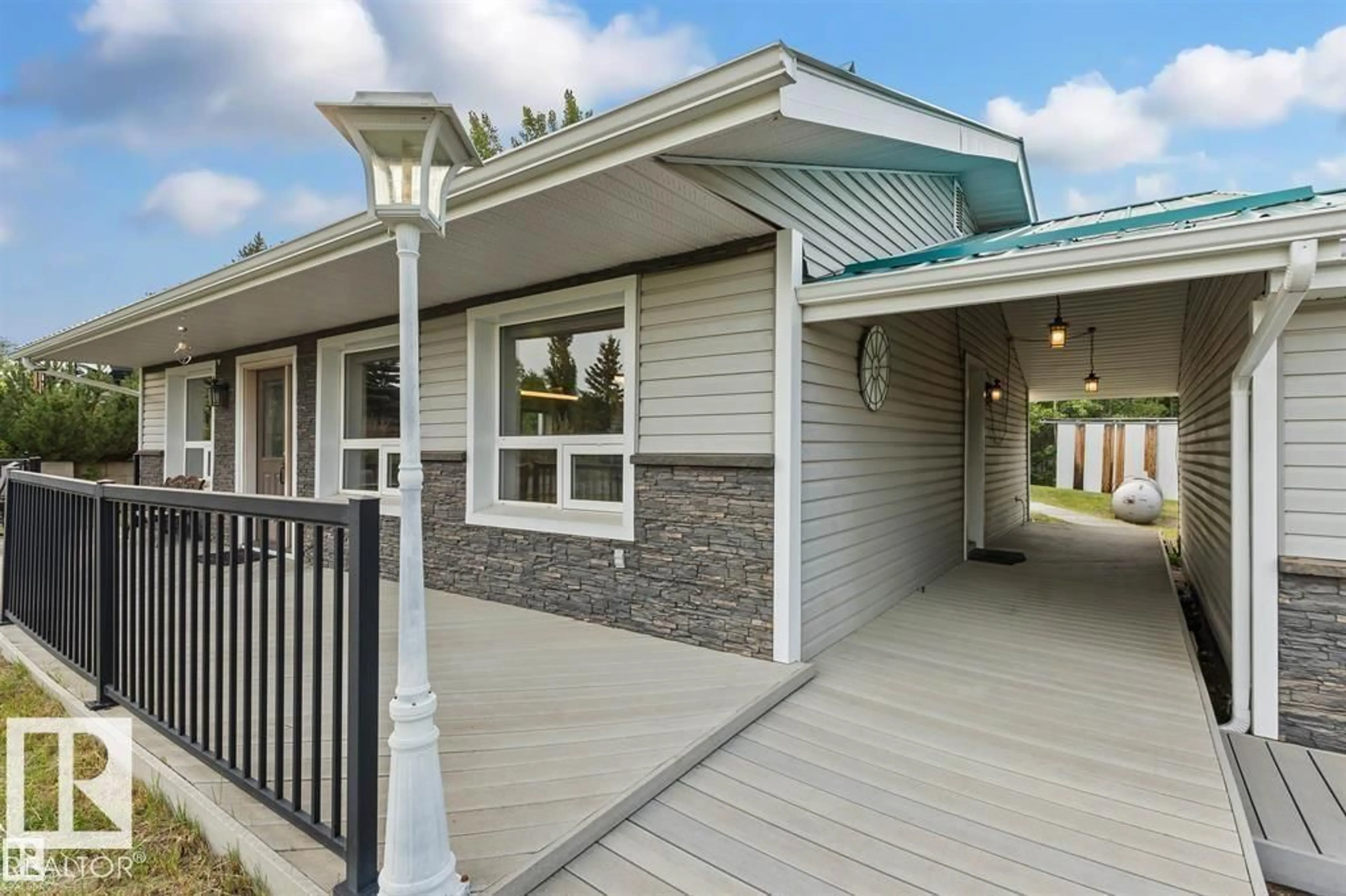 Home with vinyl exterior material, street for 242020 TWP ROAD 473 A, Rural Wetaskiwin County Alberta T0C1Z0