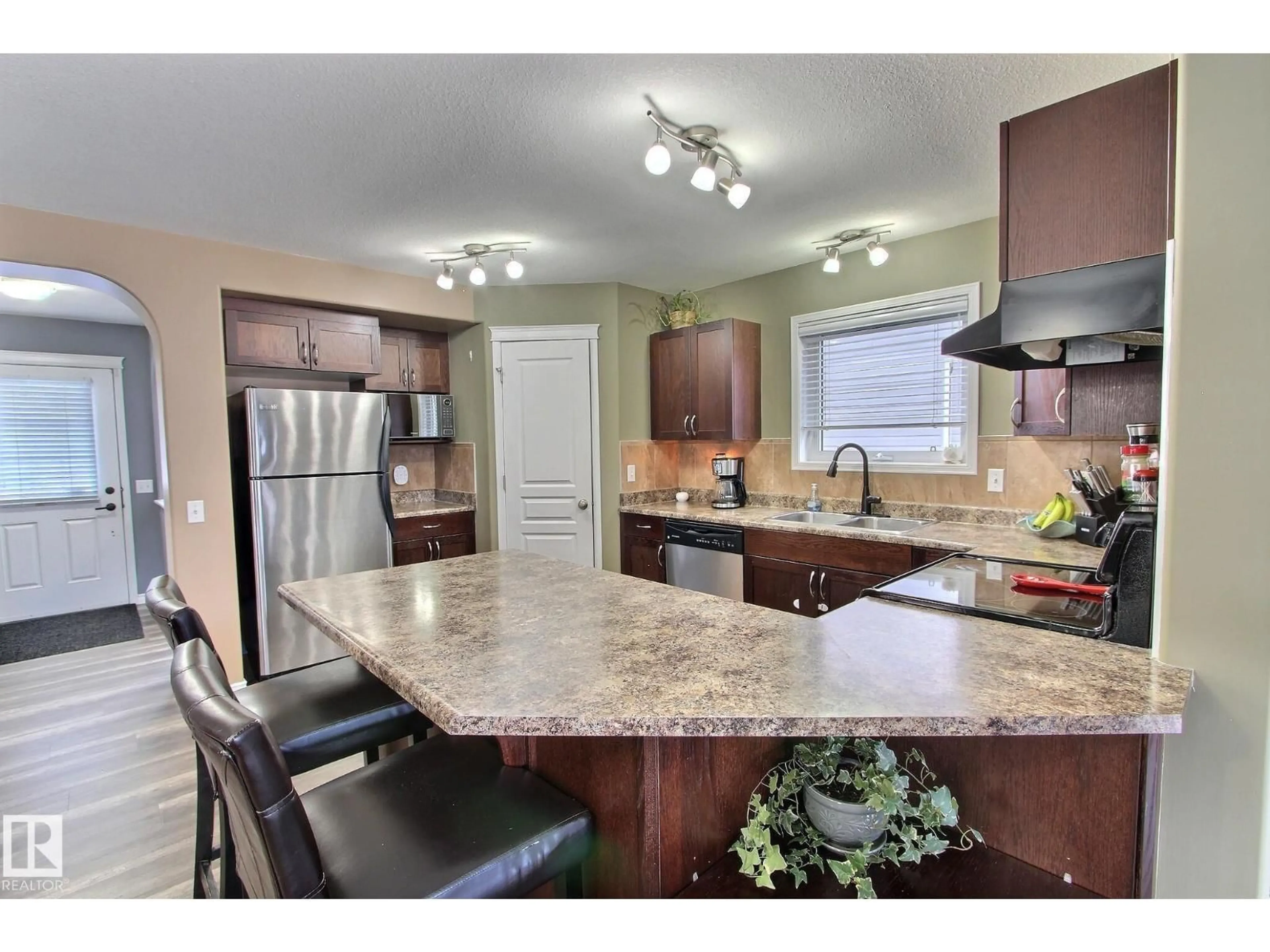 Open concept kitchen, ceramic/tile floor for 415 HEMINGWAY RD, Edmonton Alberta T6M0J8