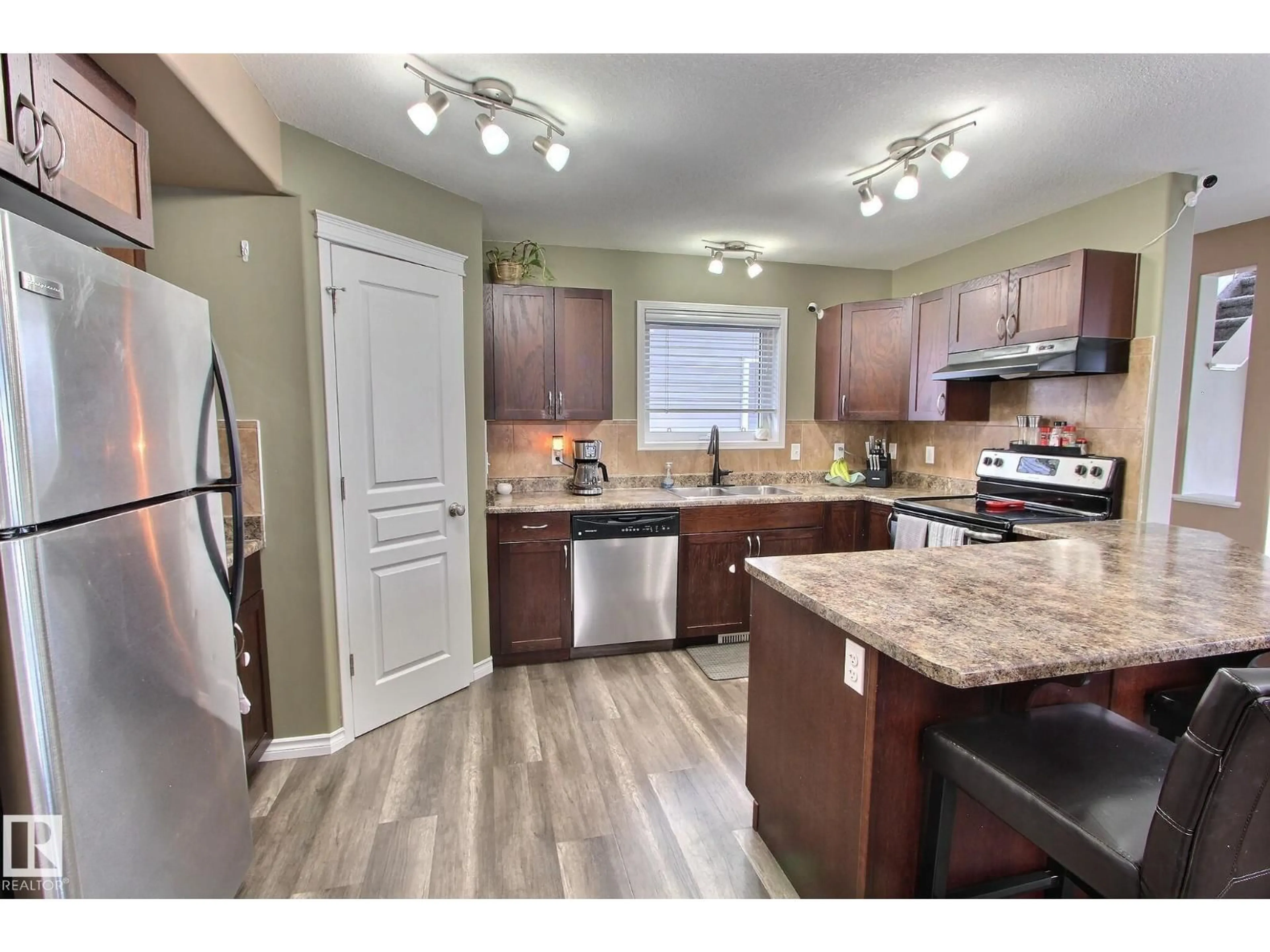 Open concept kitchen, unknown for 415 HEMINGWAY RD, Edmonton Alberta T6M0J8