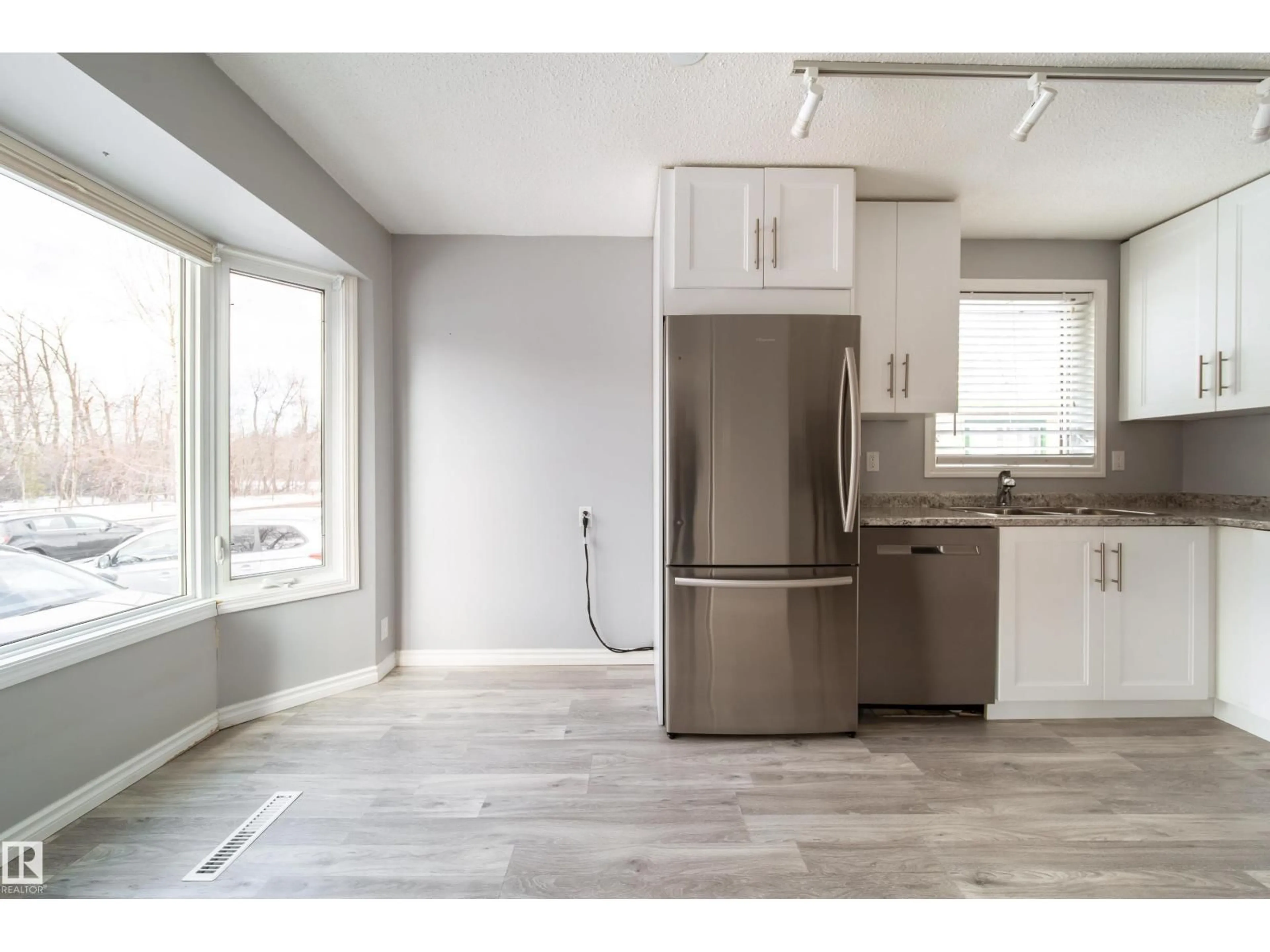 Open concept kitchen, wood/laminate floor for 67 HERON RD, Sherwood Park Alberta T8H0H1