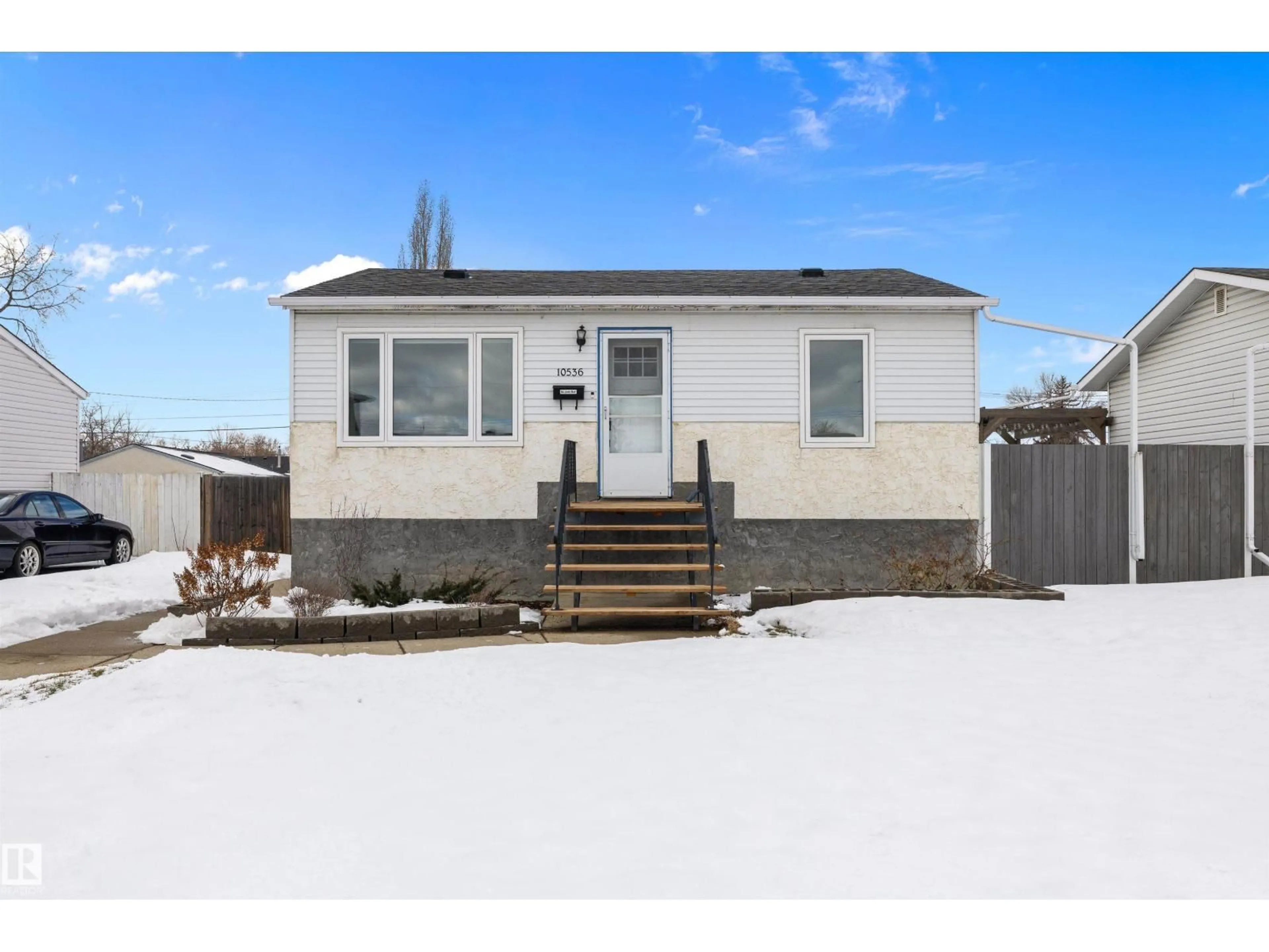 Home with vinyl exterior material, street for NW - 10536 162 ST, Edmonton Alberta T5P3M5