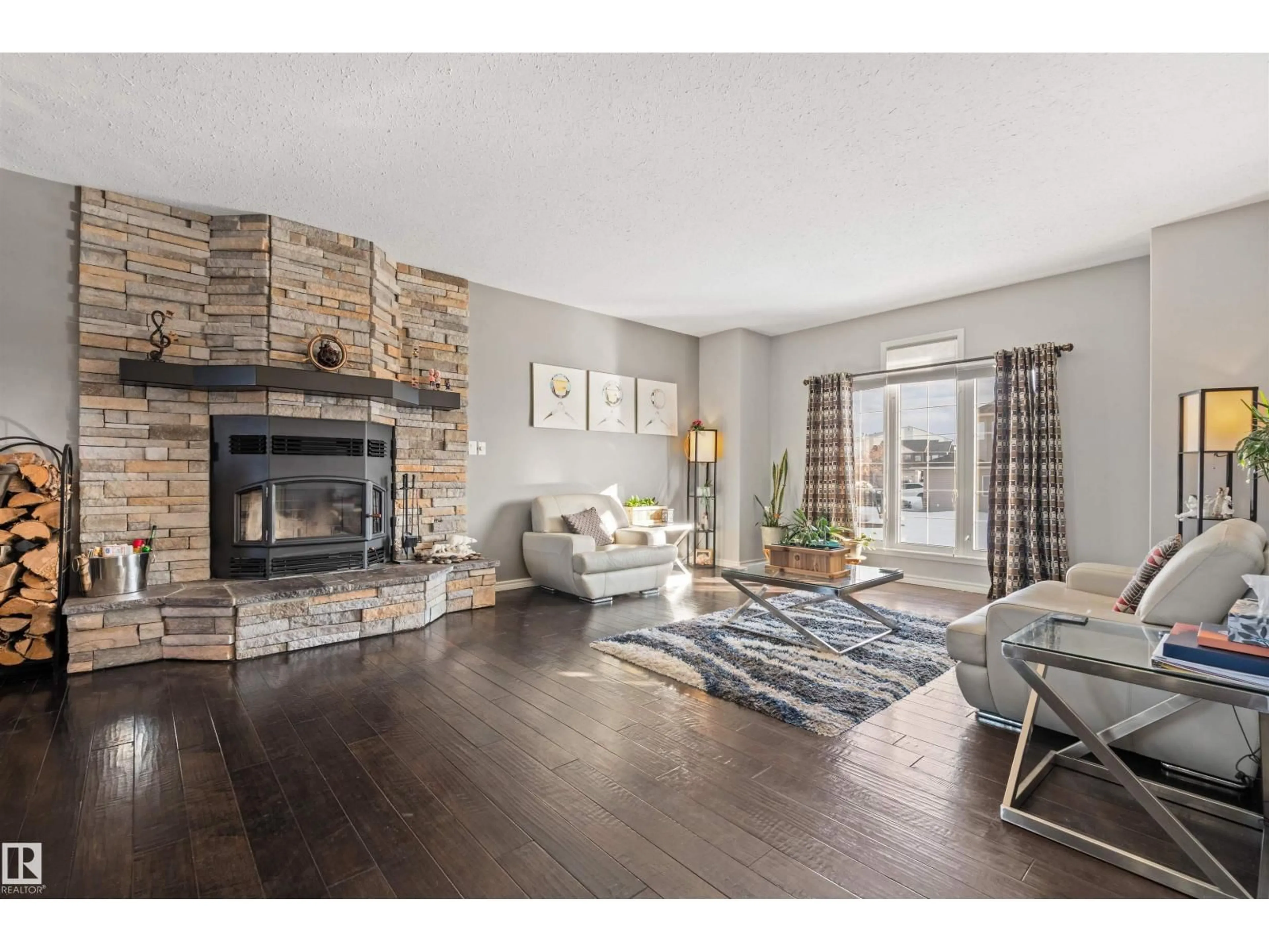 Living room with furniture, wood/laminate floor for 2011 7 AV, Cold Lake Alberta T9M2B7