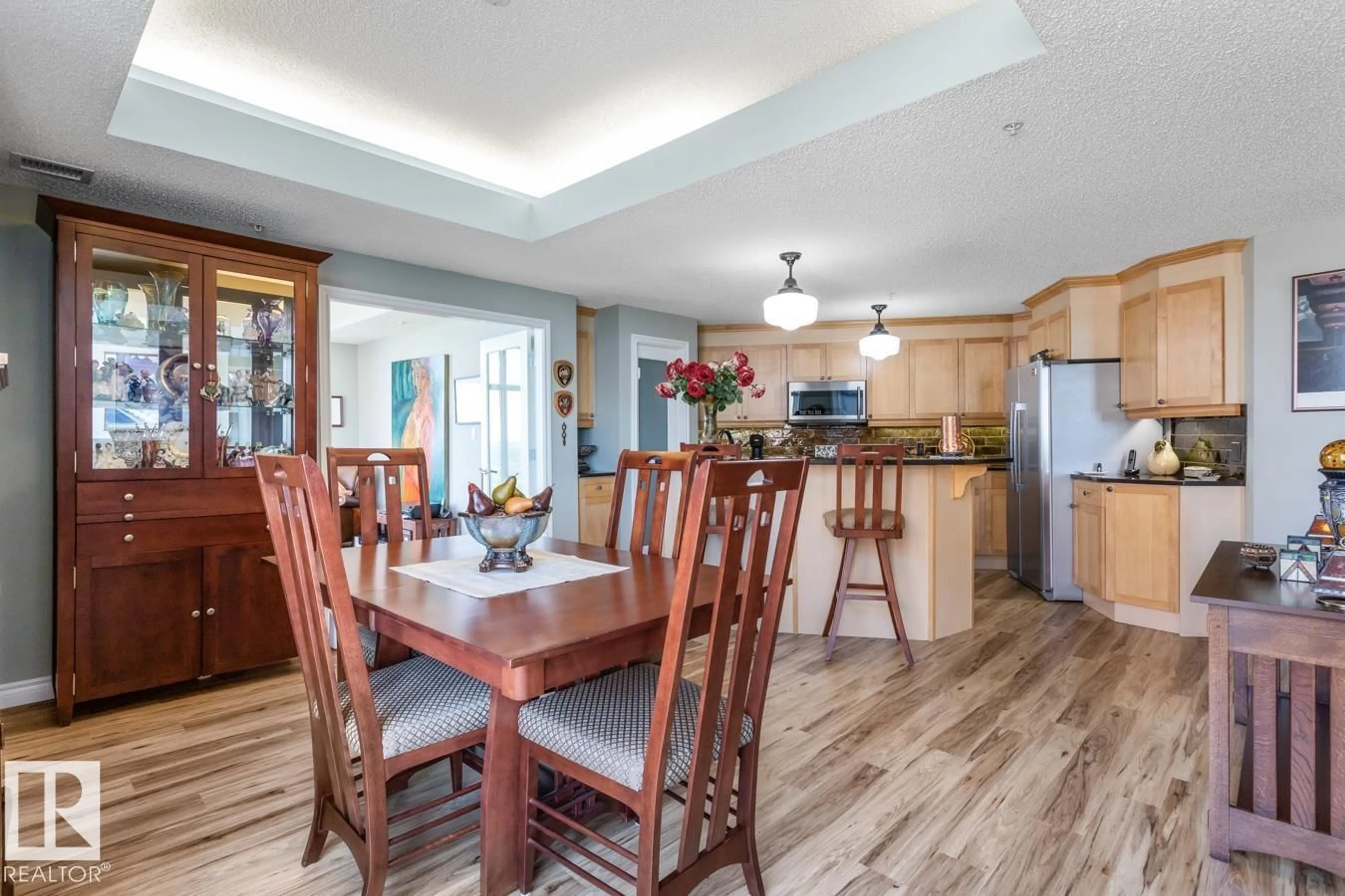 Open concept kitchen, wood/laminate floor for #1103 - 9020 JASPER AV, Edmonton Alberta T5H3S8